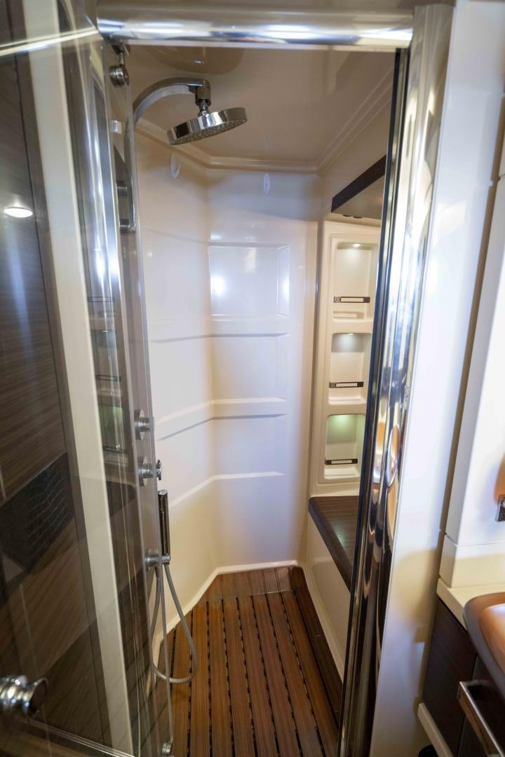 a bathroom with a glass shower aboard 4-PLAY Yacht for Sale