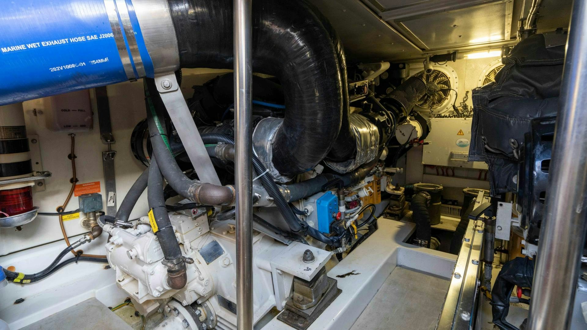 a machine with a large metal pipe aboard 4-PLAY Yacht for Sale