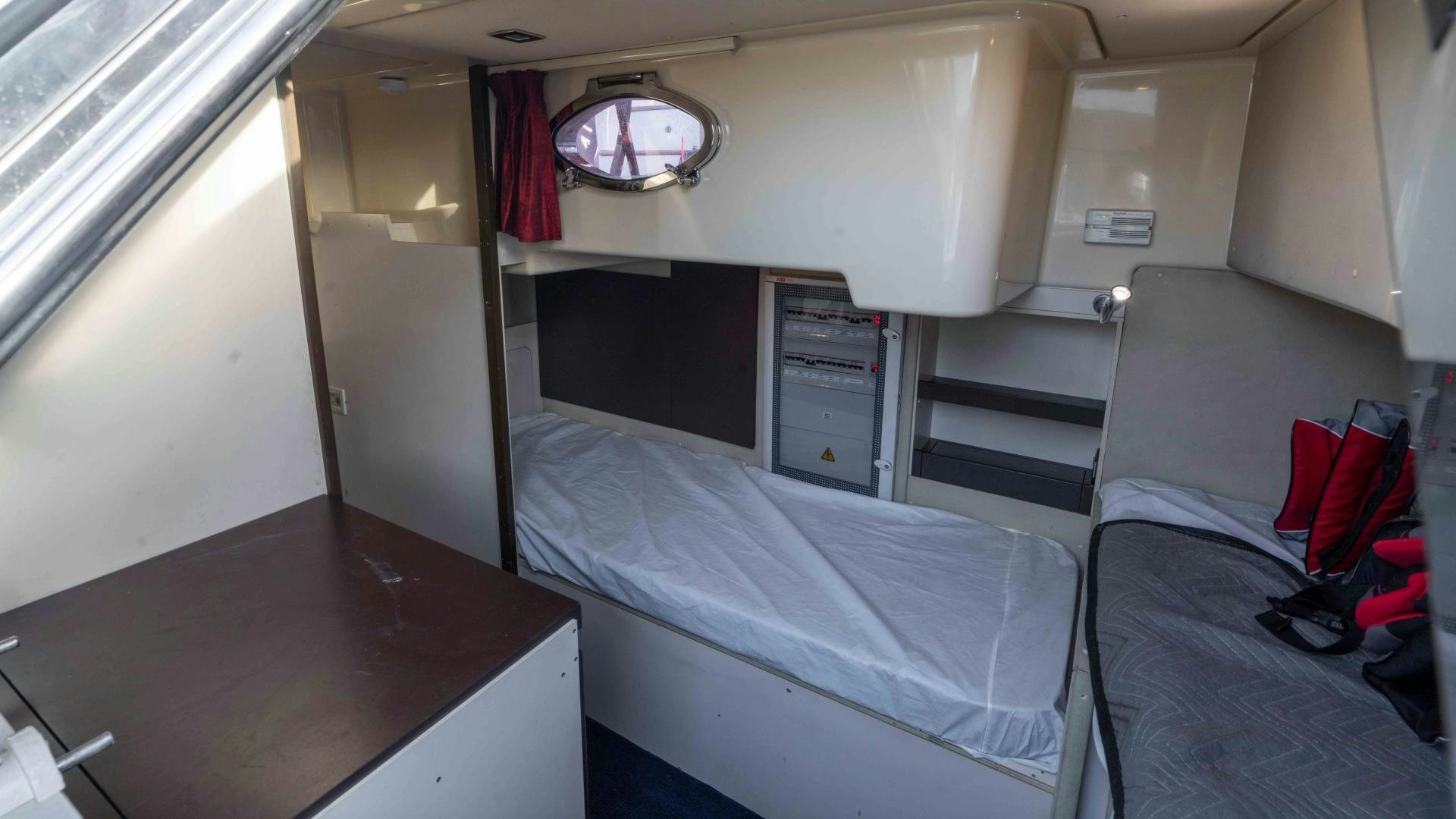 a room with bunk beds aboard 4-PLAY Yacht for Sale