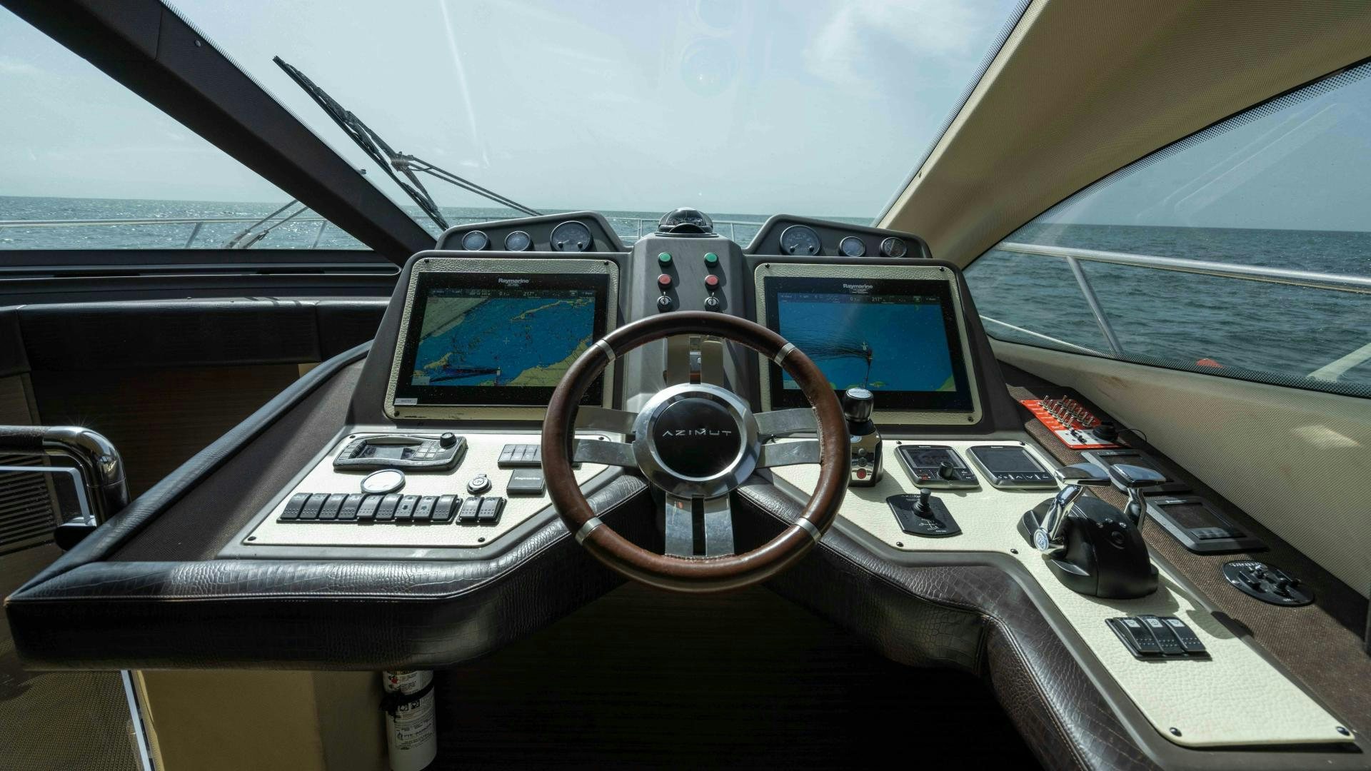 inside of a car aboard 4-PLAY Yacht for Sale