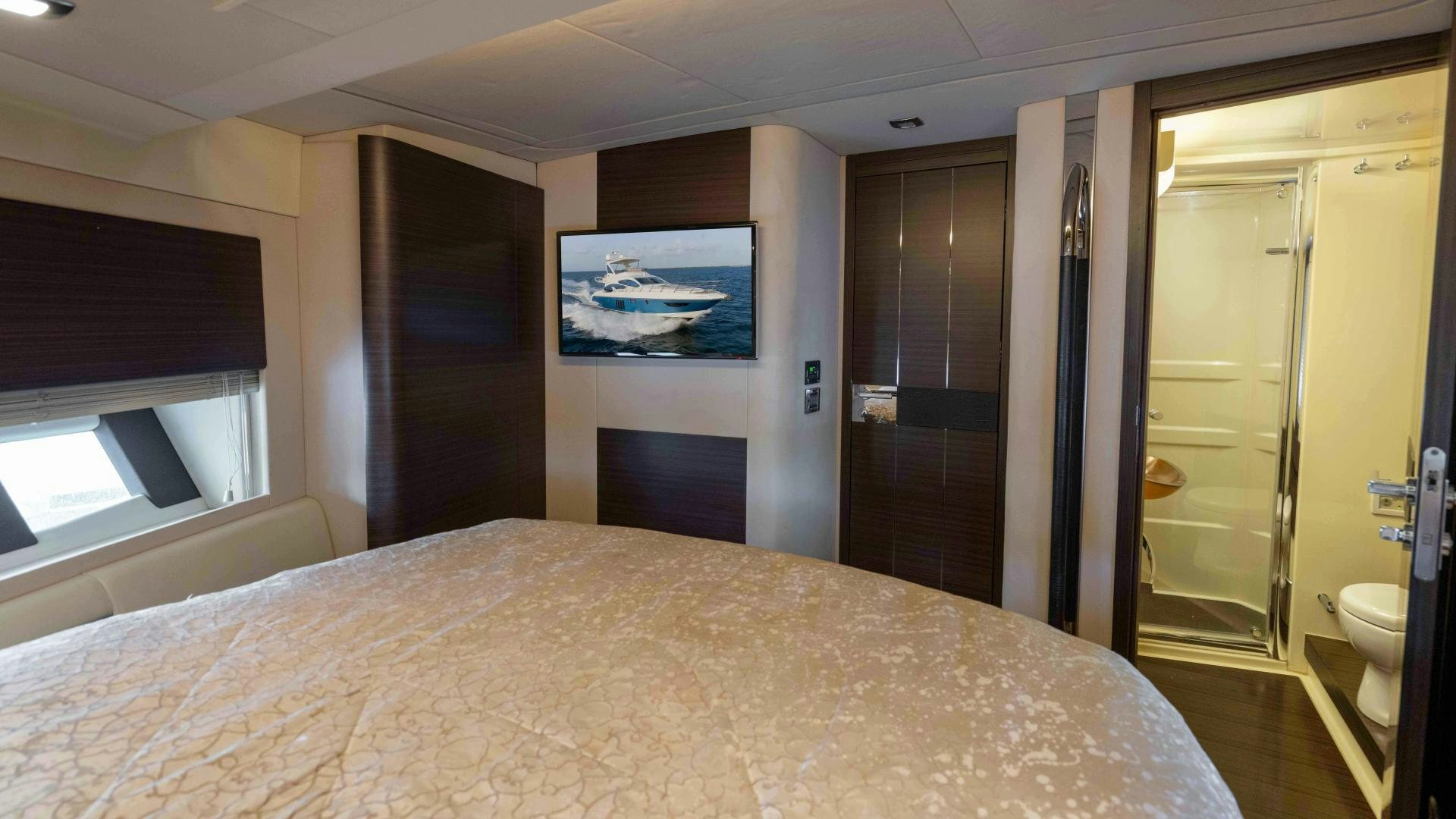 a bed in a room aboard 4-PLAY Yacht for Sale