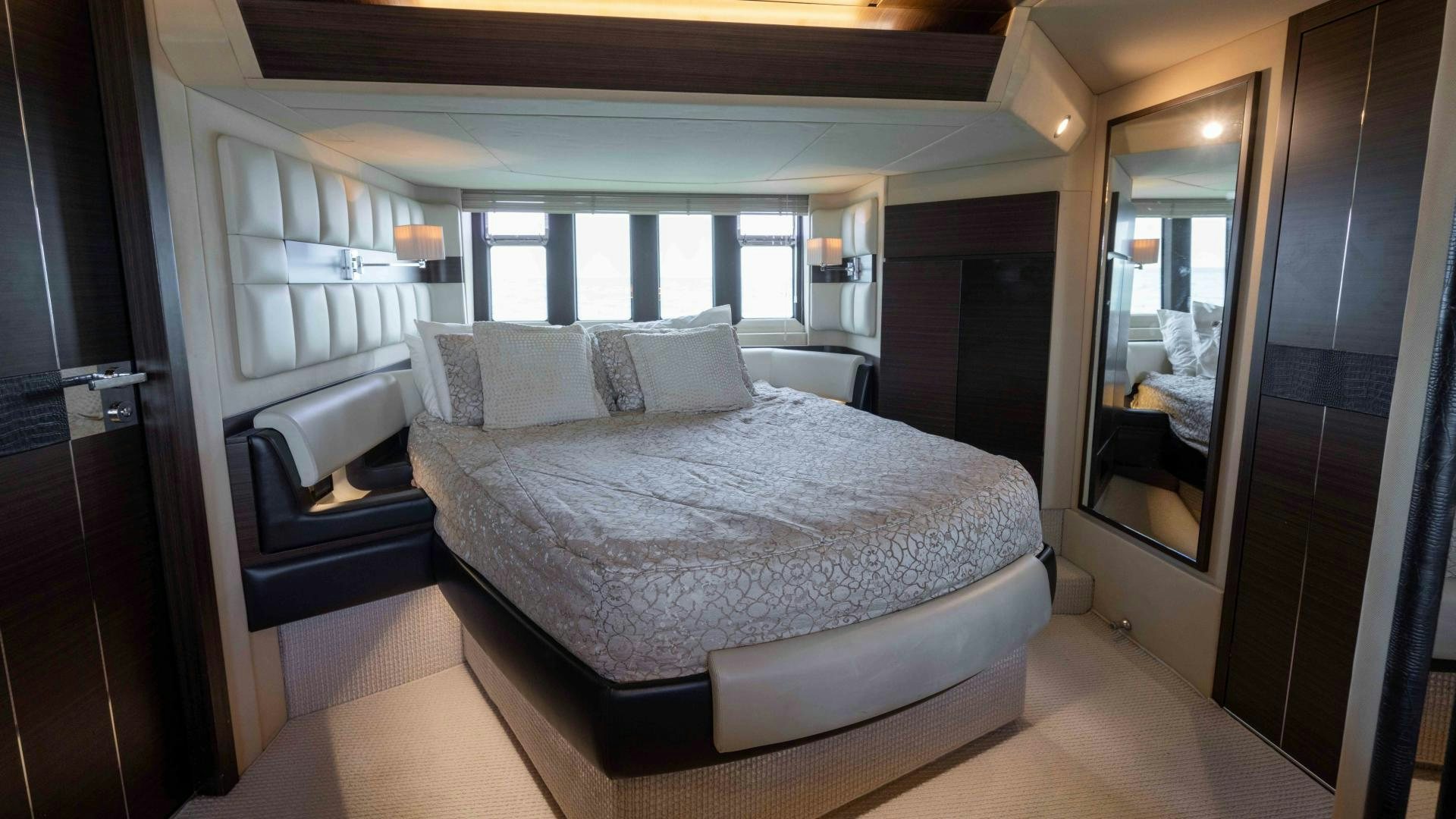 a bed in a room aboard 4-PLAY Yacht for Sale