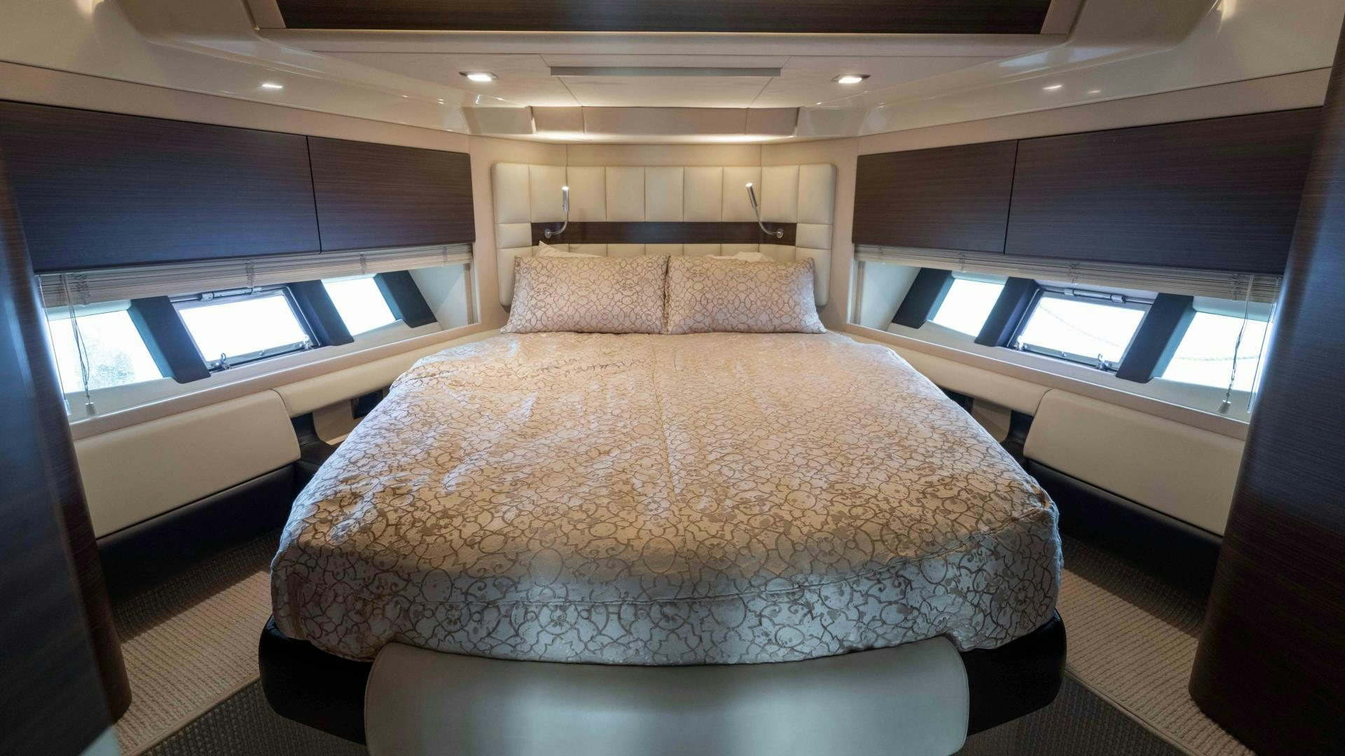a bed in a room aboard 4-PLAY Yacht for Sale