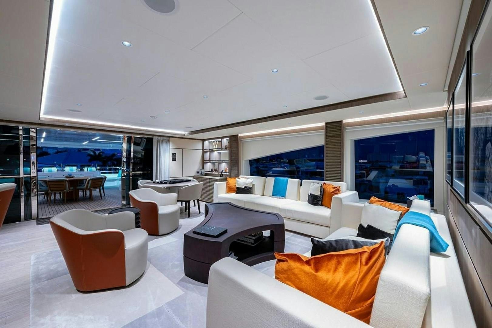 a room with a large window and a view of the ocean aboard CHECKED OUT Yacht for Sale