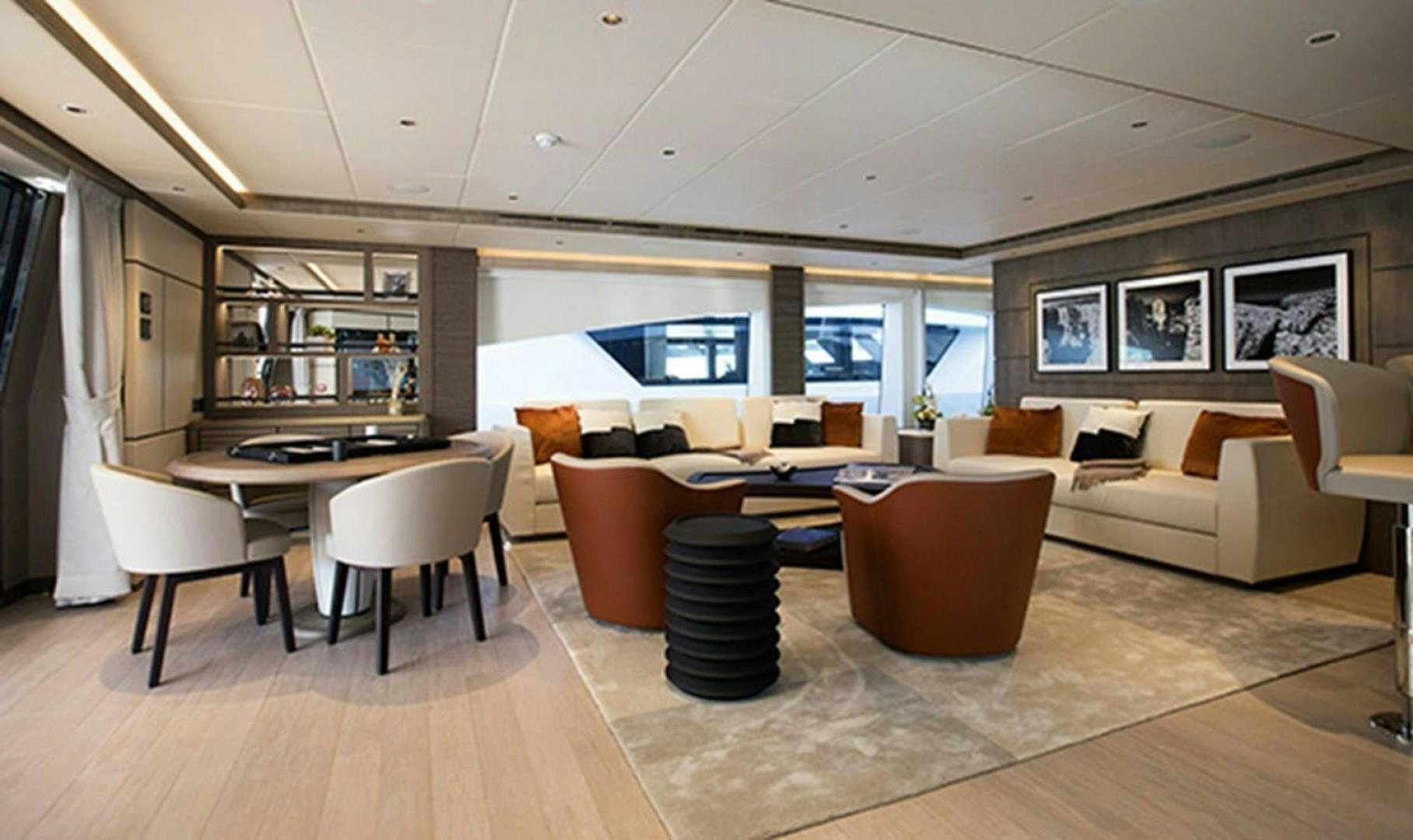 a living room with a couch and a table aboard CHECKED OUT Yacht for Sale