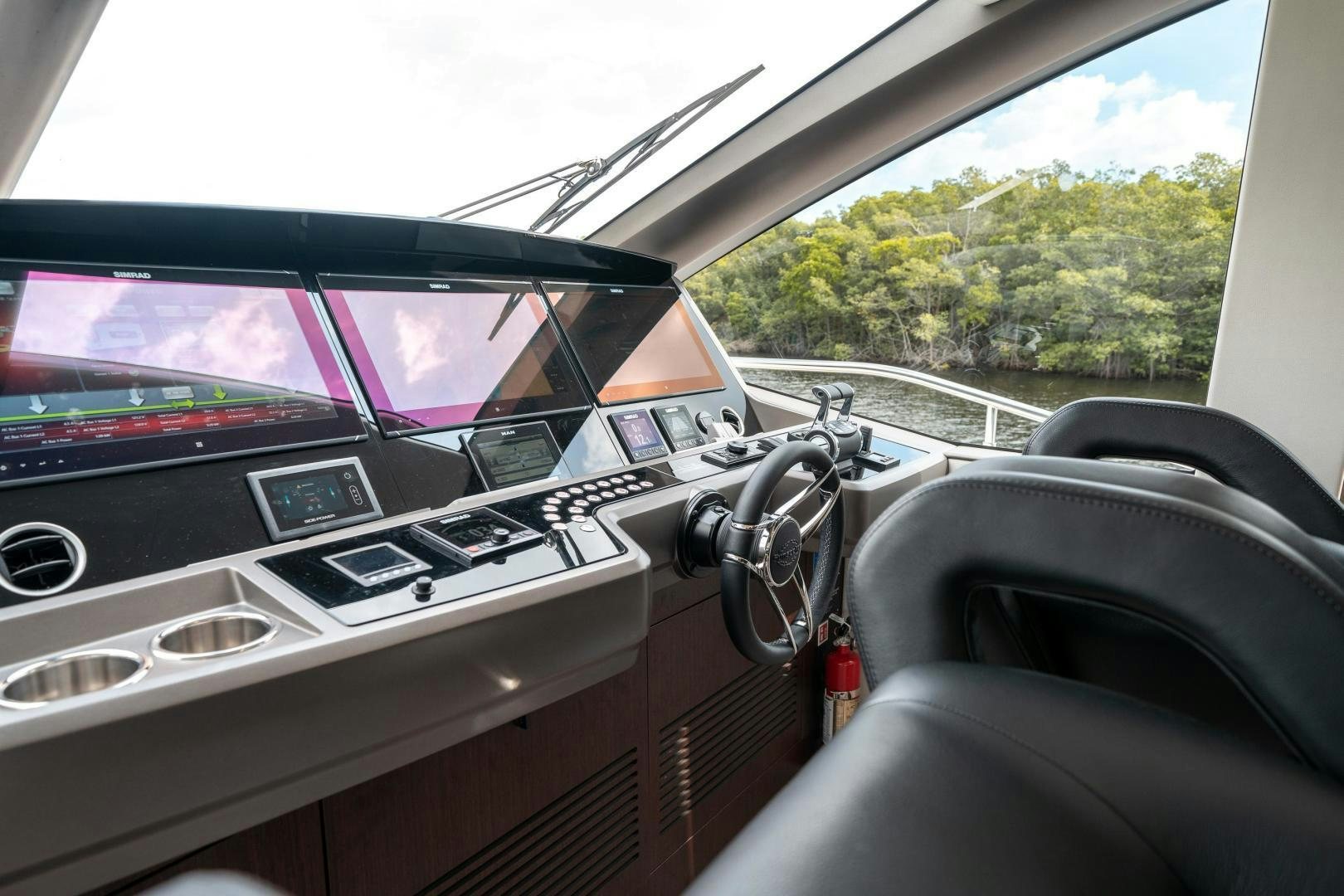 inside of a car aboard ONE Yacht for Sale