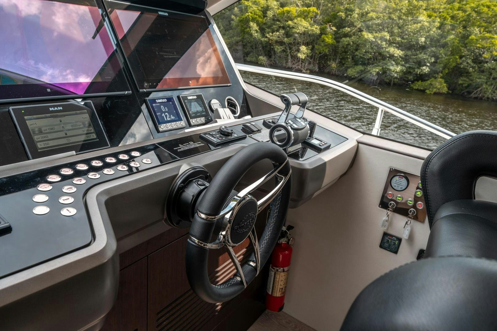 inside of a car aboard ONE Yacht for Sale