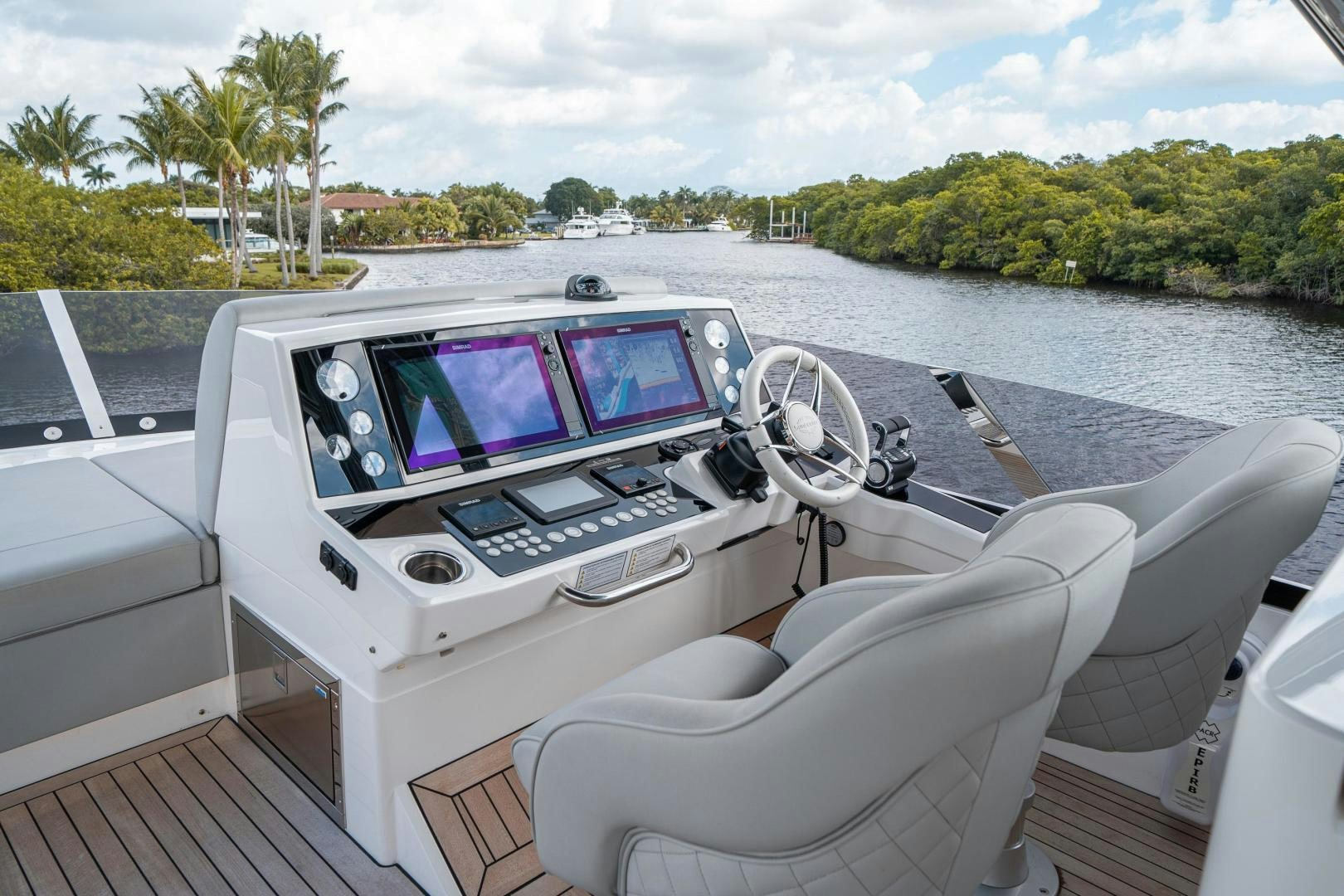 a boat with a steering wheel aboard ONE Yacht for Sale