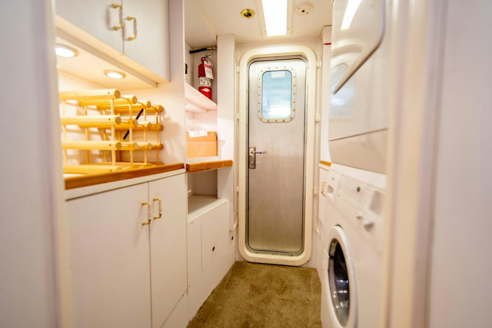 a room with a door open aboard the happy boat Yacht for Sale