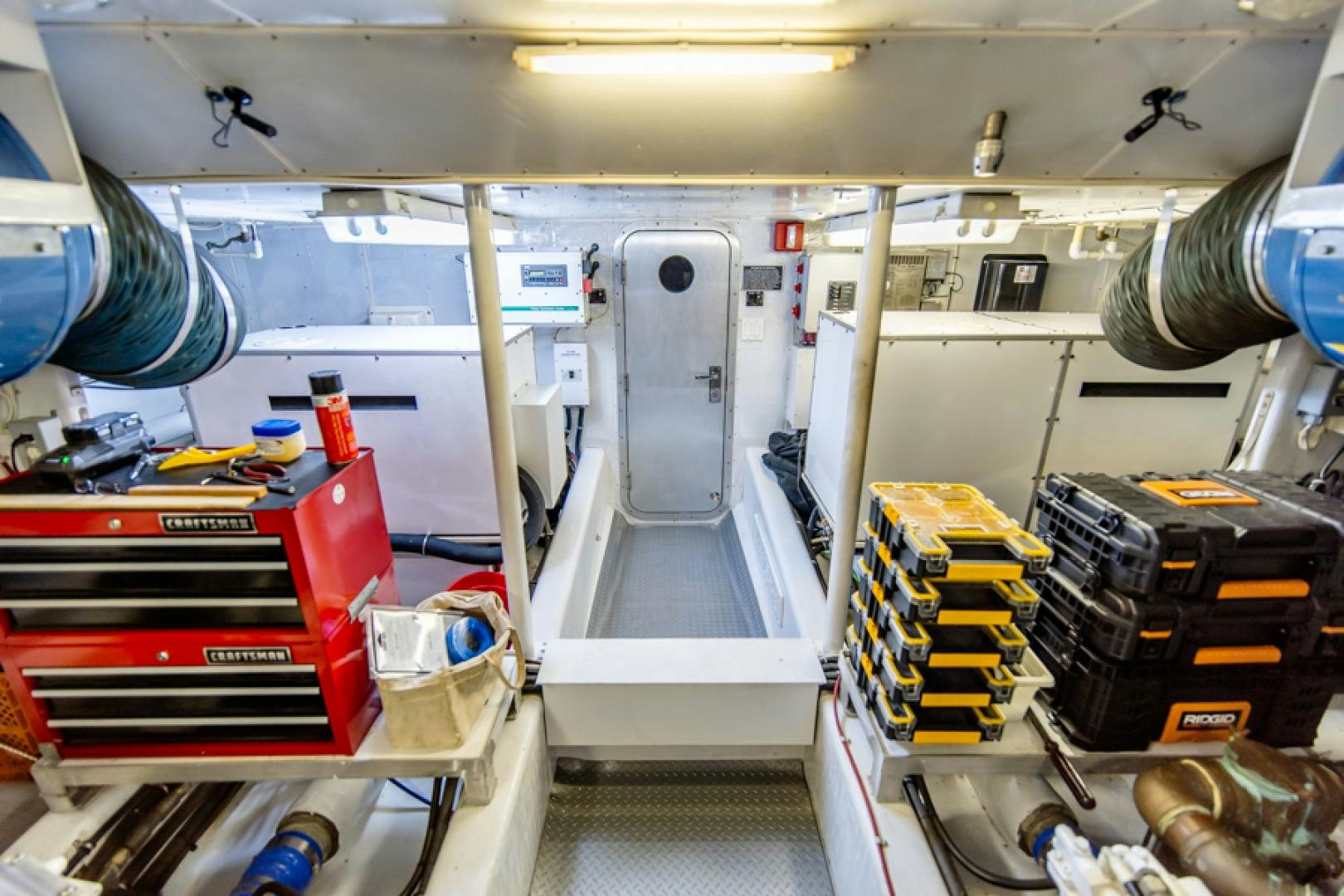 a room with machinery and equipment aboard the happy boat Yacht for Sale