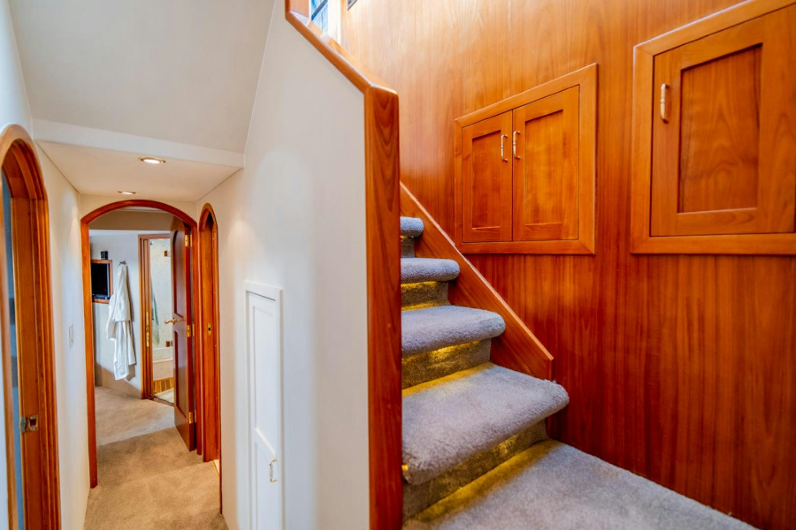 a staircase in a house aboard the happy boat Yacht for Sale