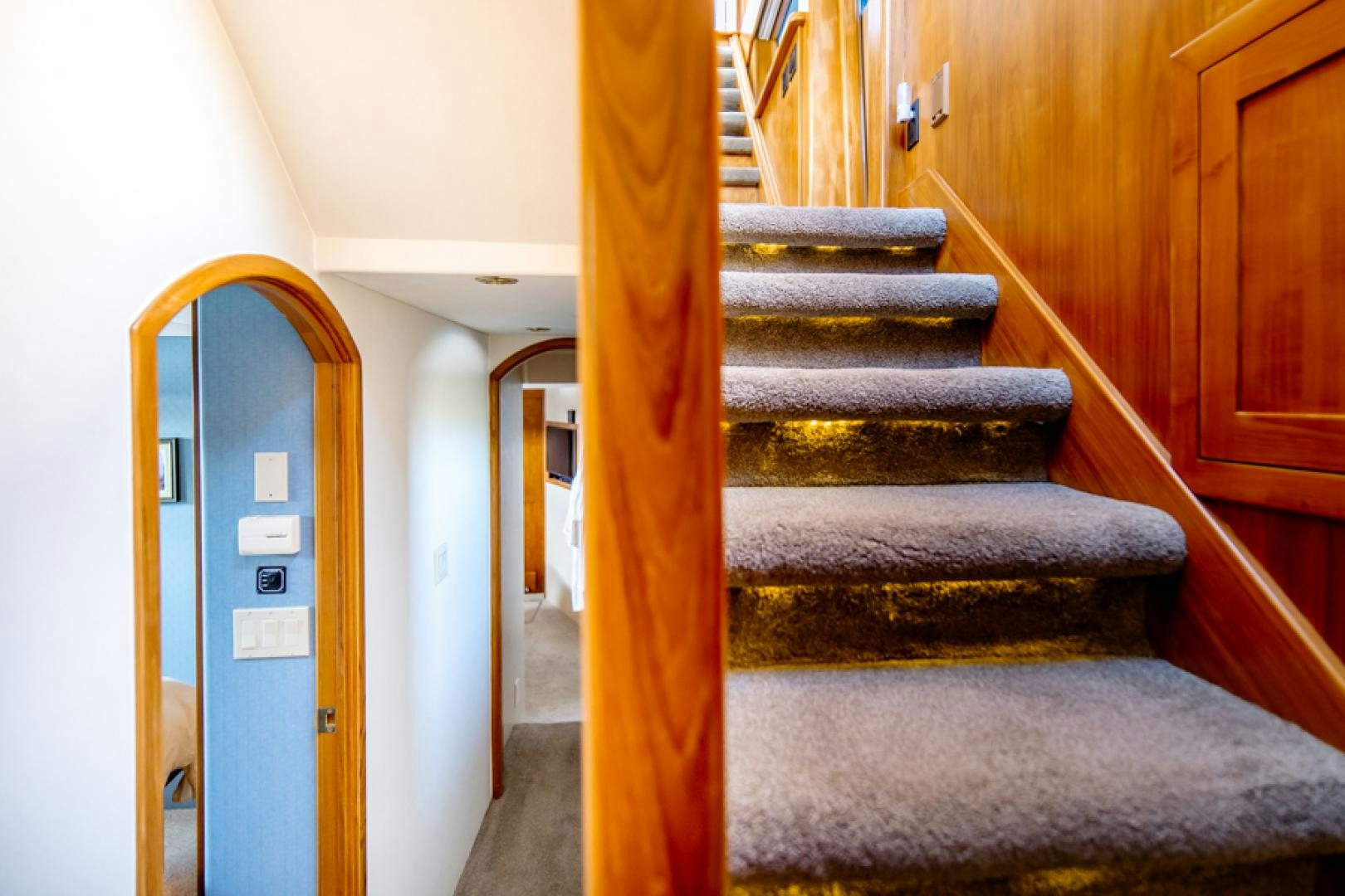 a staircase in a house aboard the happy boat Yacht for Sale
