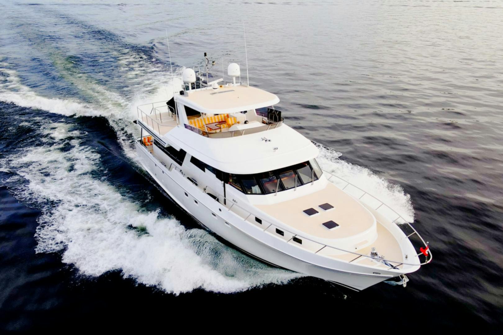a boat on the water aboard the happy boat Yacht for Sale