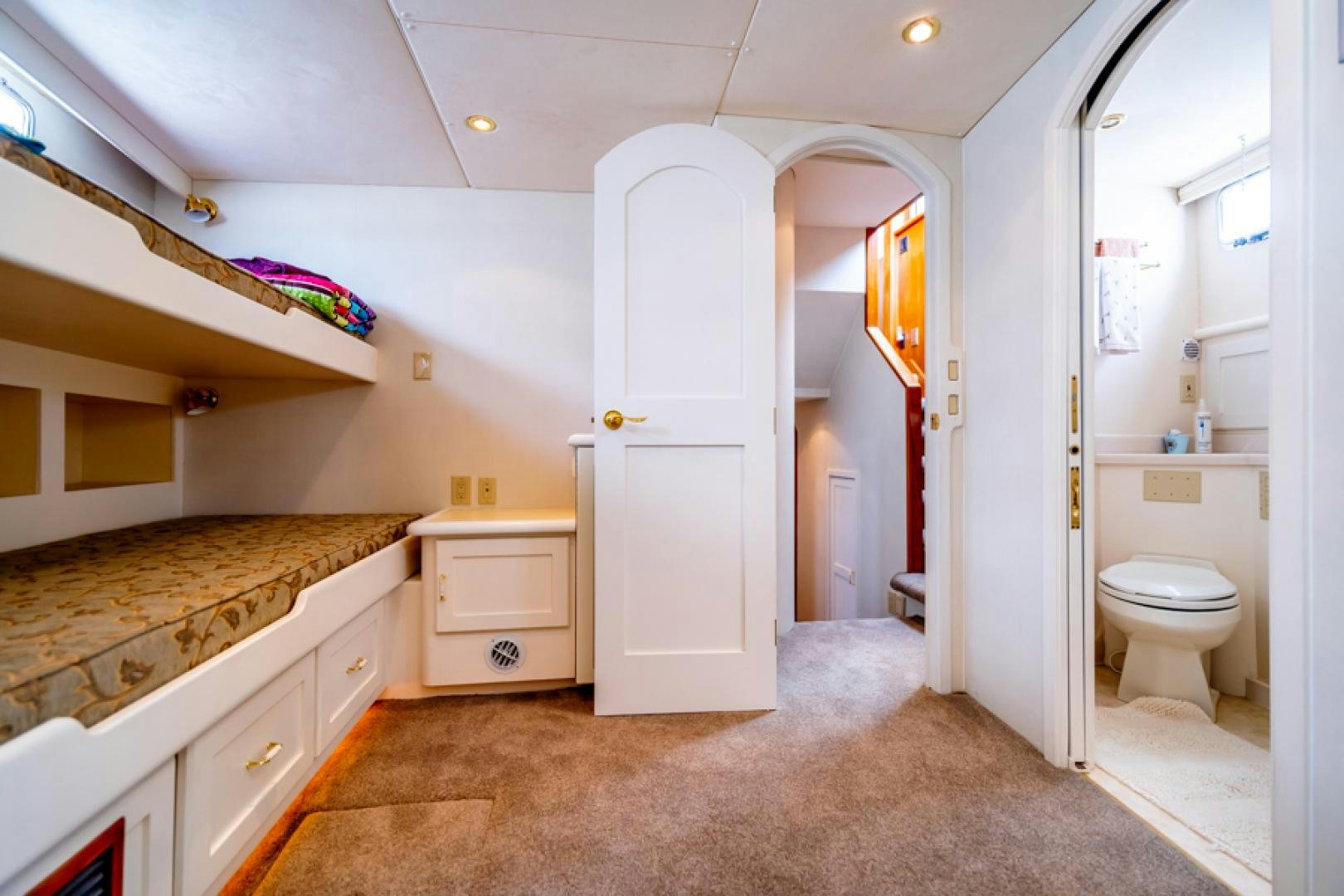 a bathroom with a marble counter top aboard the happy boat Yacht for Sale