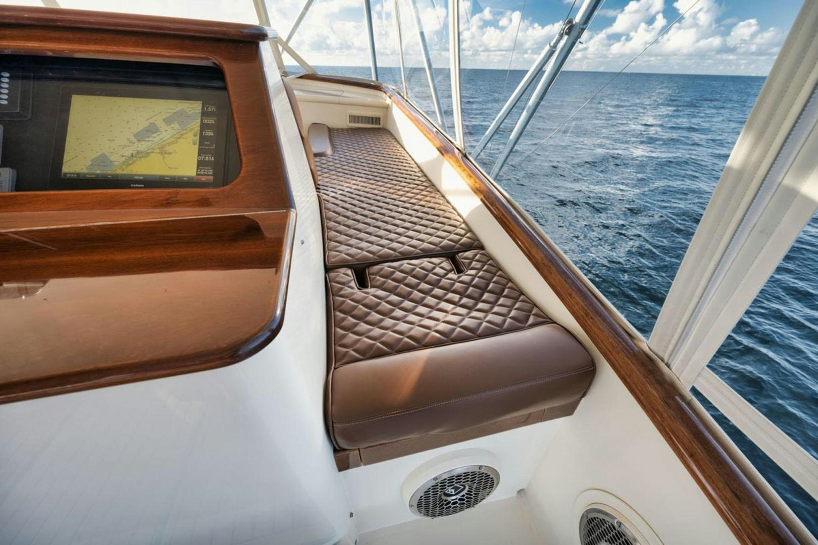 a boat with a wood deck aboard SIR REEL Yacht for Sale