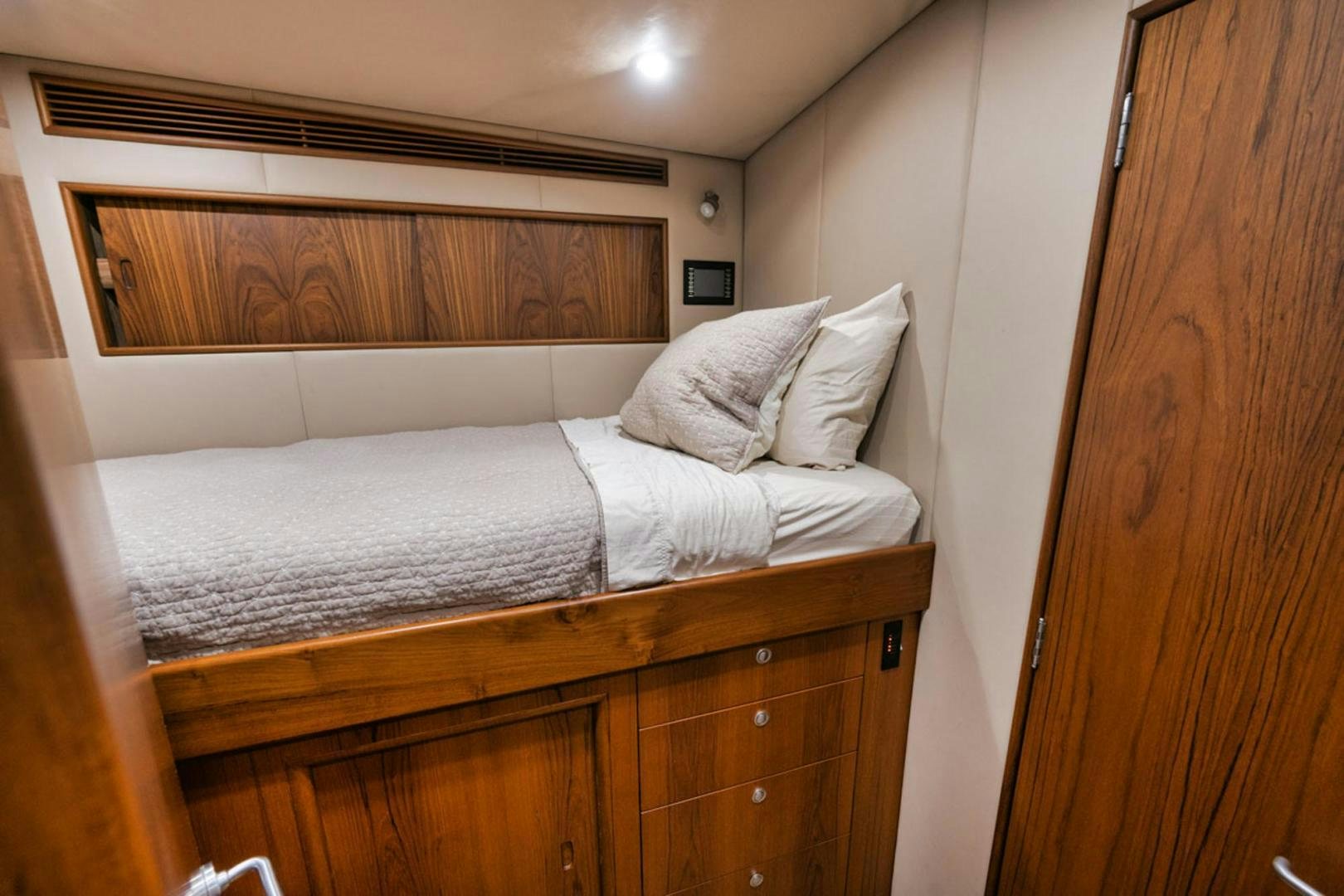 a bed with white sheets aboard SIR REEL Yacht for Sale