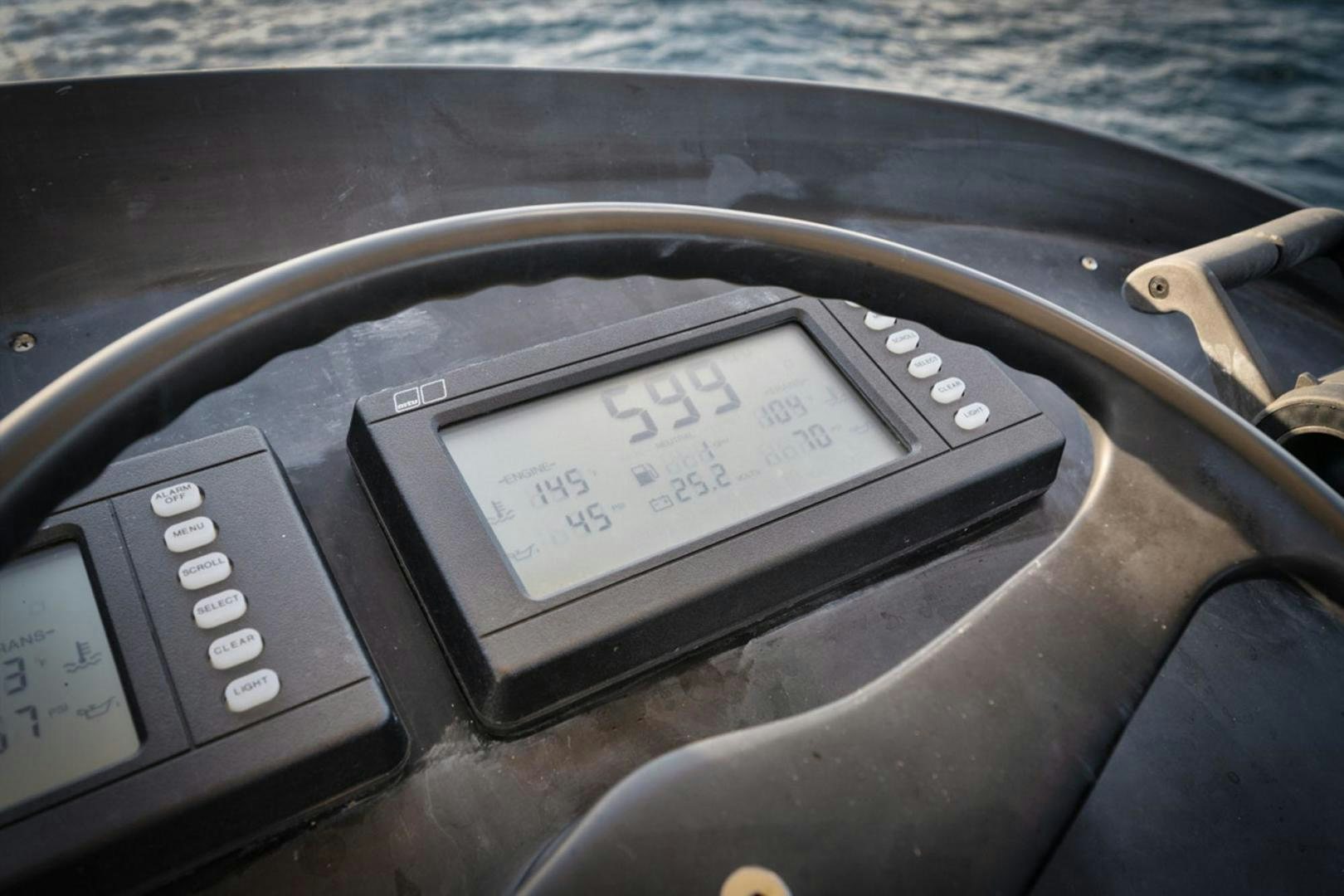 a cell phone on a dashboard aboard SIR REEL Yacht for Sale