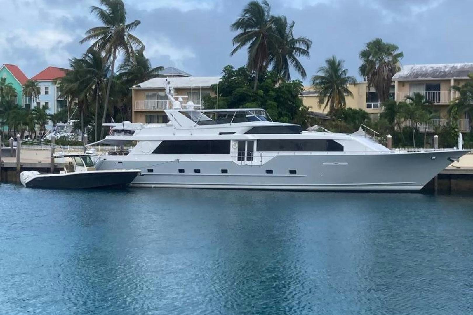 a white yacht in a large body of water aboard MARGATE Yacht for Charter