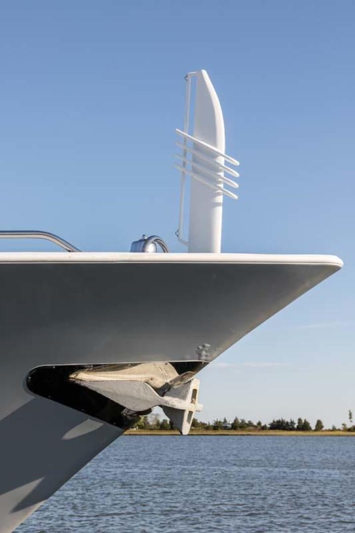 a plane flying over water aboard MARGATE Yacht for Charter