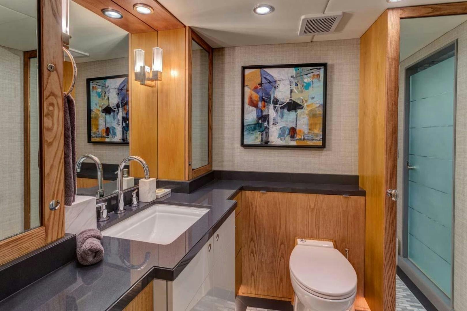 a bathroom with a sink and a toilet aboard MARGATE Yacht for Charter