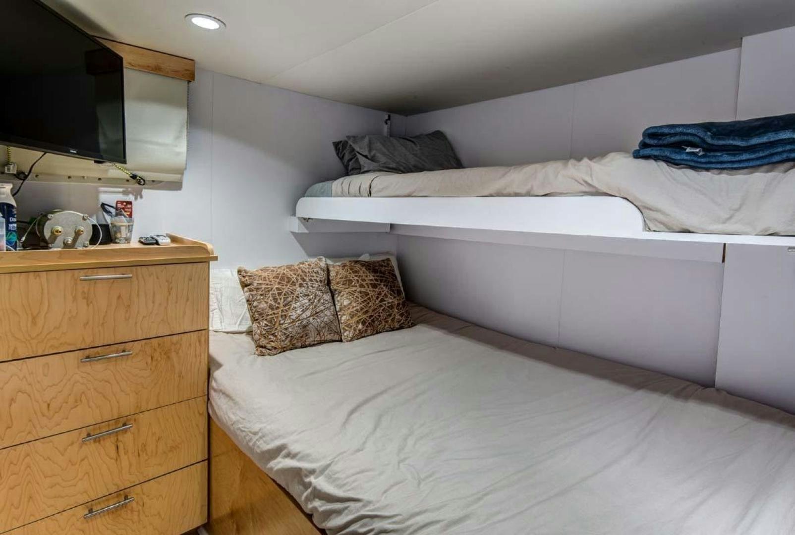 a bedroom with two beds aboard MARGATE Yacht for Charter