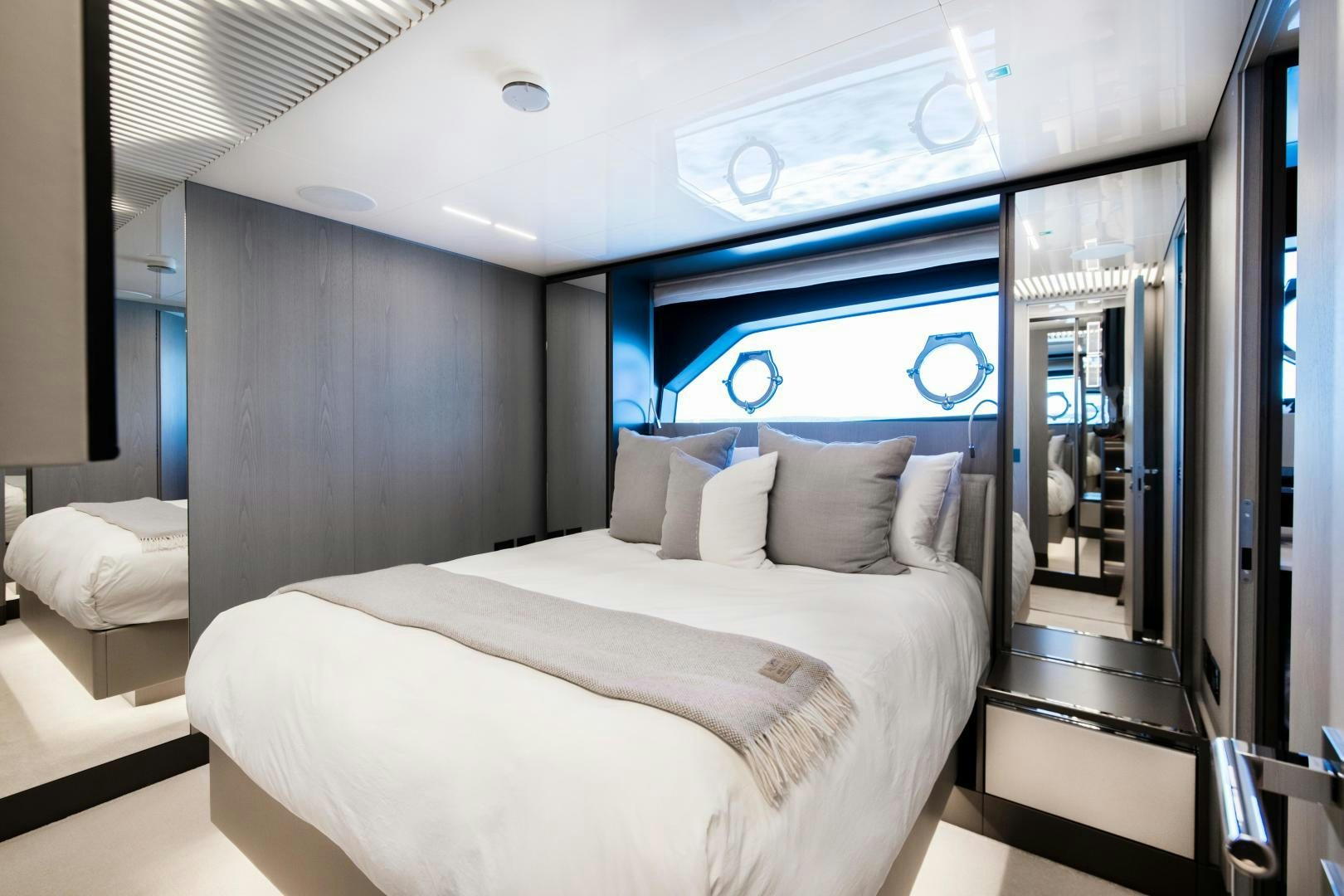 a bed in a room aboard FERRETTI 850 Yacht for Sale