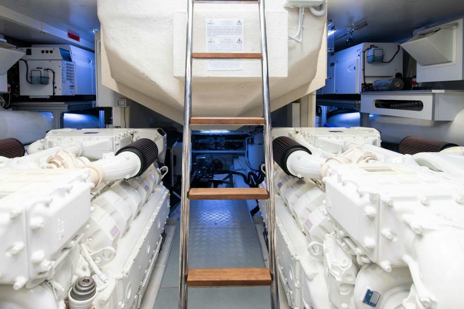 a room with a few white machines aboard FERRETTI 850 Yacht for Sale
