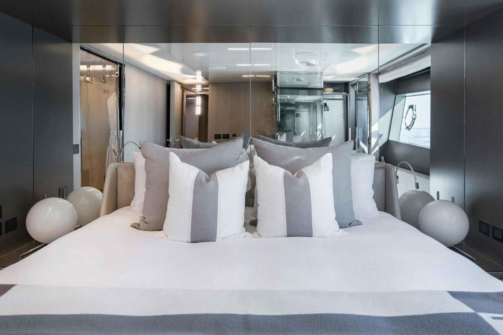 a bed with white sheets aboard FERRETTI 850 Yacht for Sale