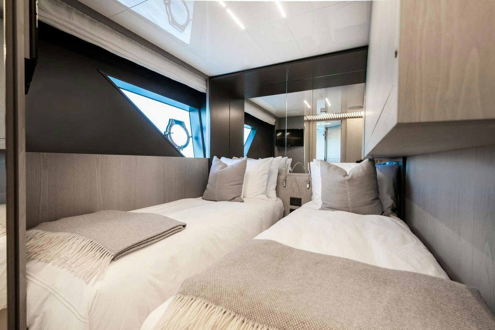 a room with two beds aboard FERRETTI 850 Yacht for Sale