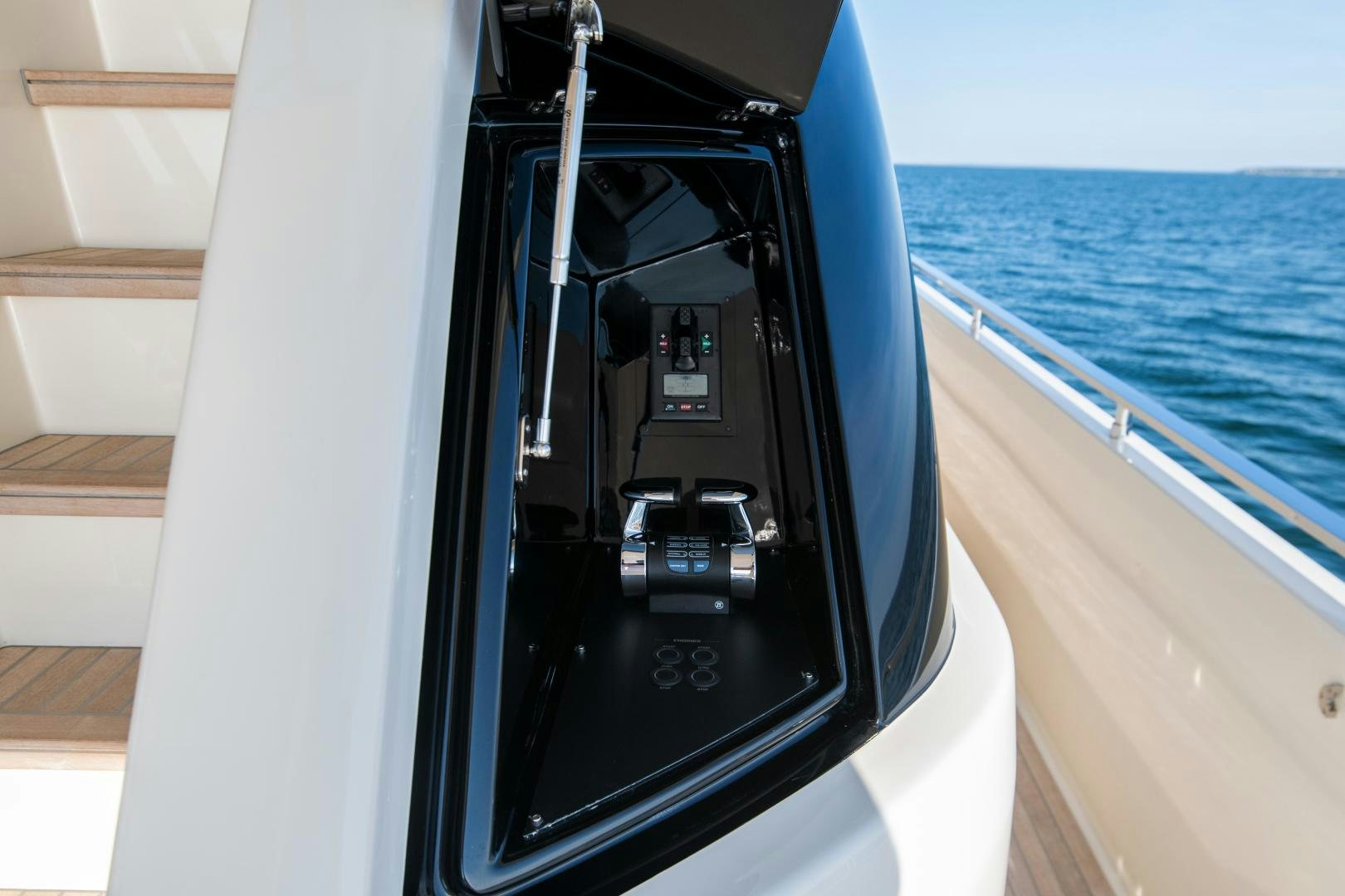 a black and white boat on a body of water aboard FERRETTI 850 Yacht for Sale