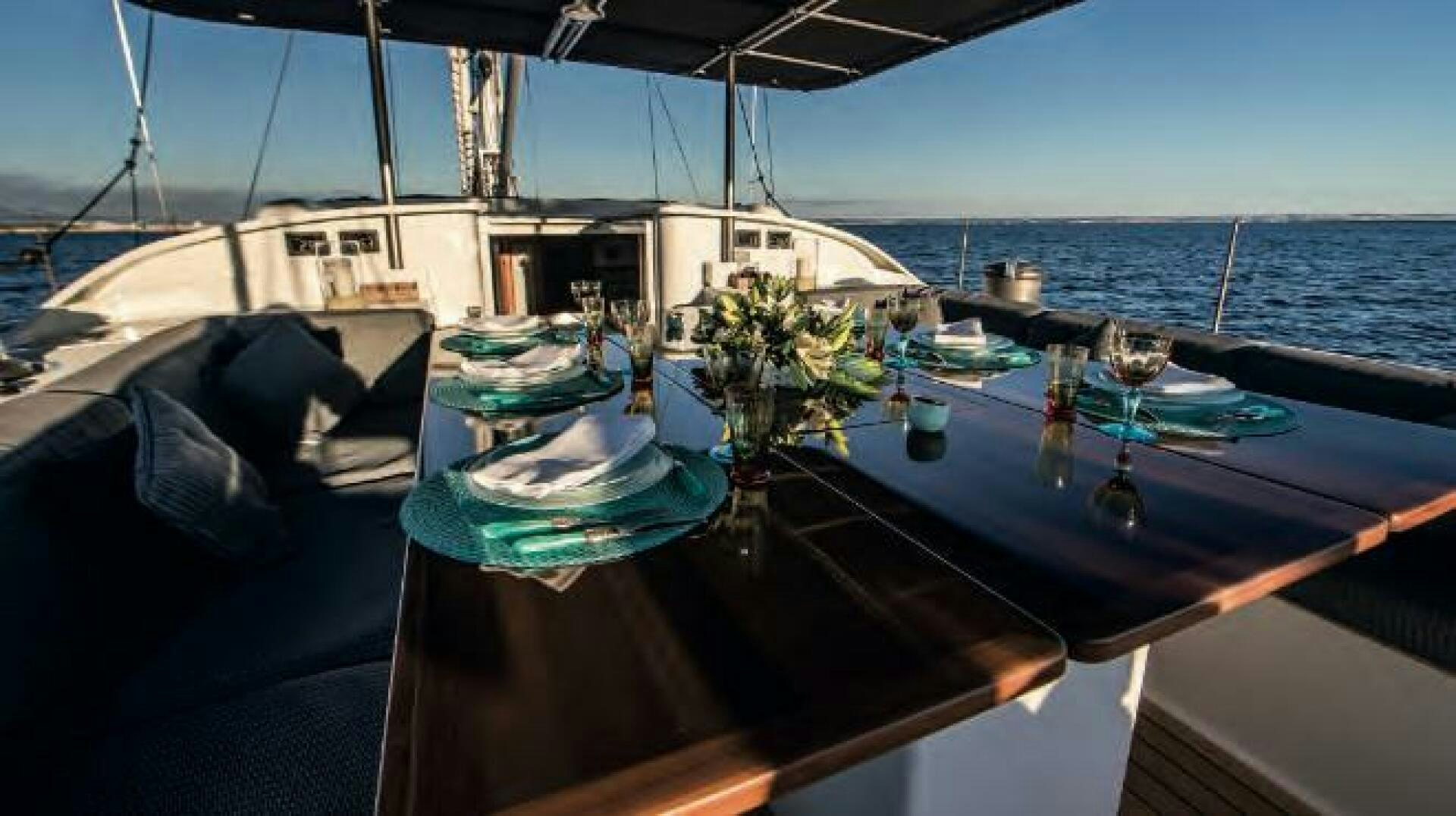 a table with a set of glasses on it aboard FANCY Yacht for Sale