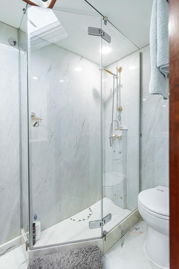 a bathroom with a shower unit aboard FANCY Yacht for Sale