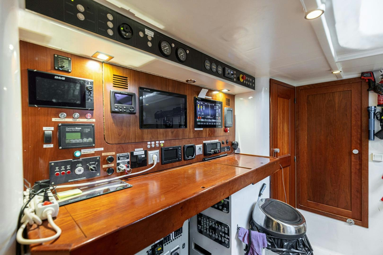 a wood kitchen with a wood counter aboard FANCY Yacht for Sale