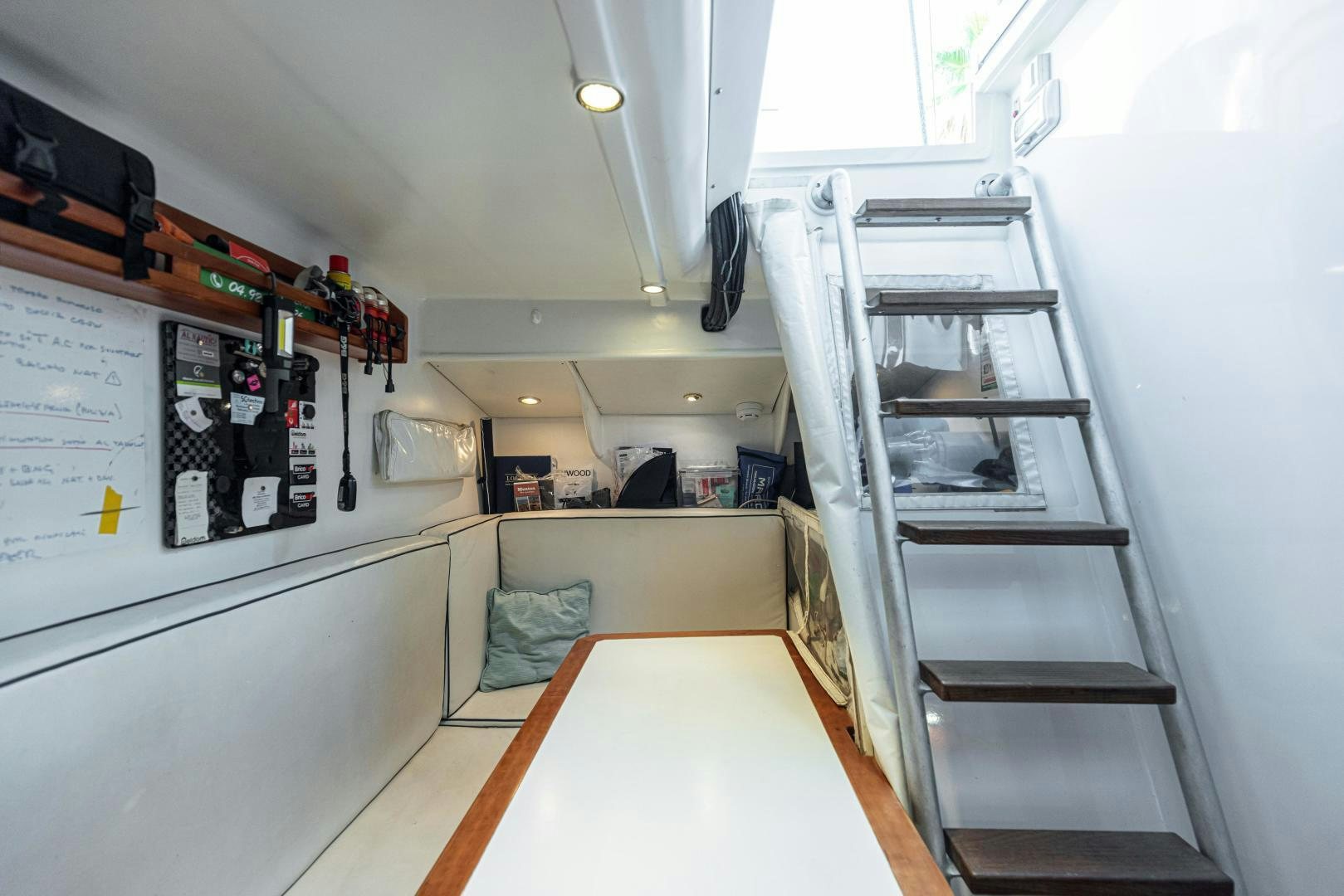 a room with a ladder and shelves aboard FANCY Yacht for Sale