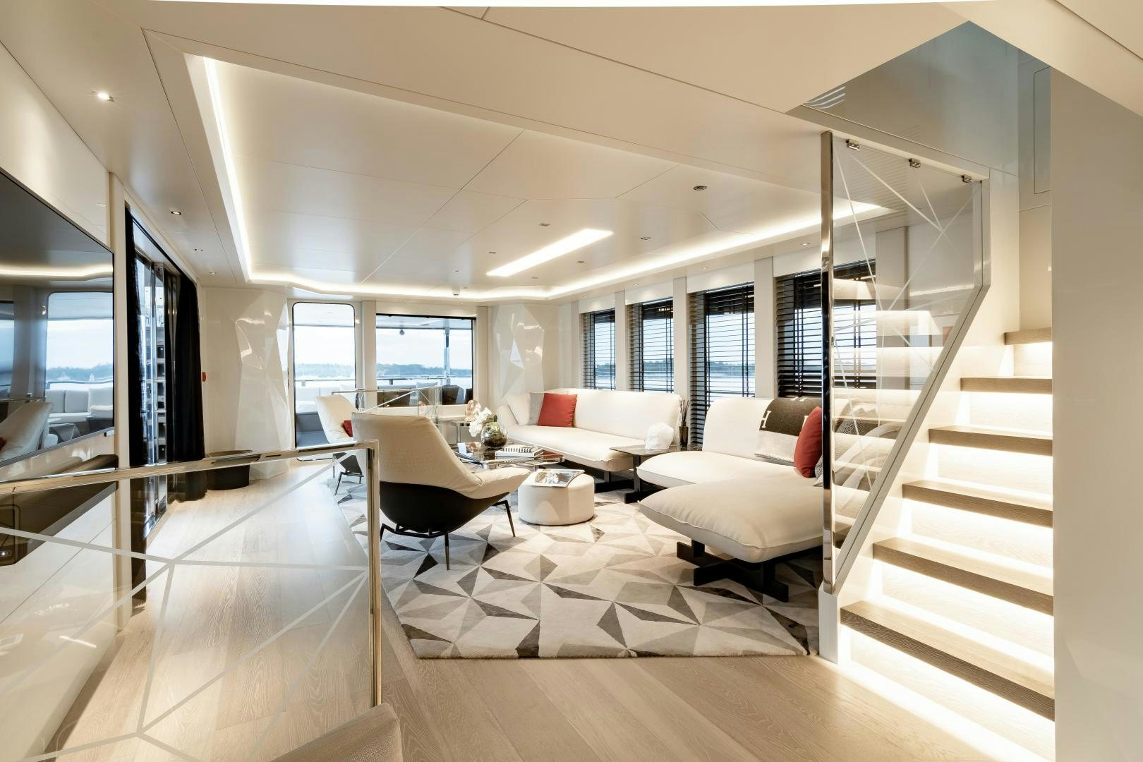 a modern looking living room aboard EVADNE ROCK 85 HULL 4 Yacht for Sale