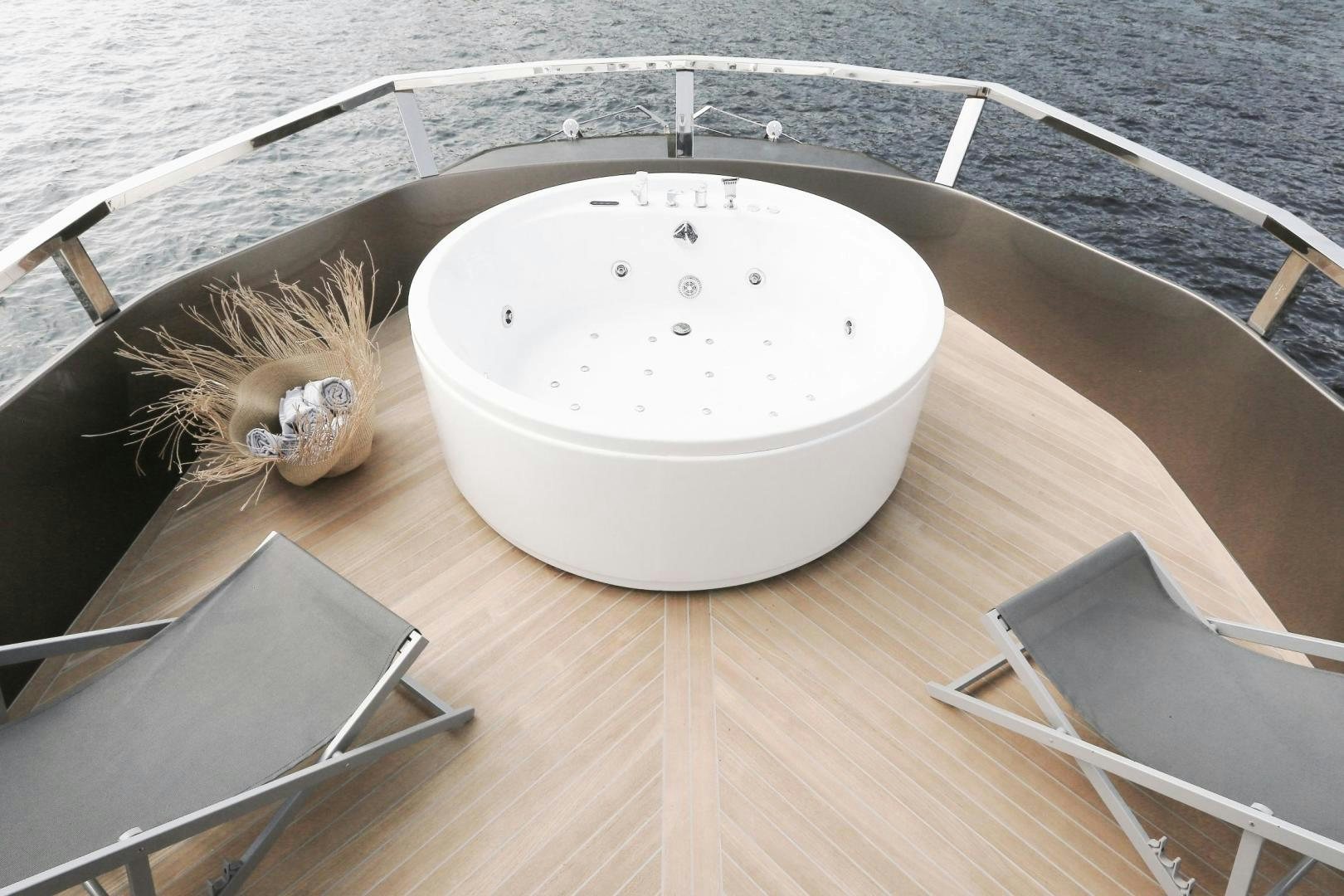 a white bathtub with a sink on it aboard EVADNE ROCK 85 HULL 4 Yacht for Sale
