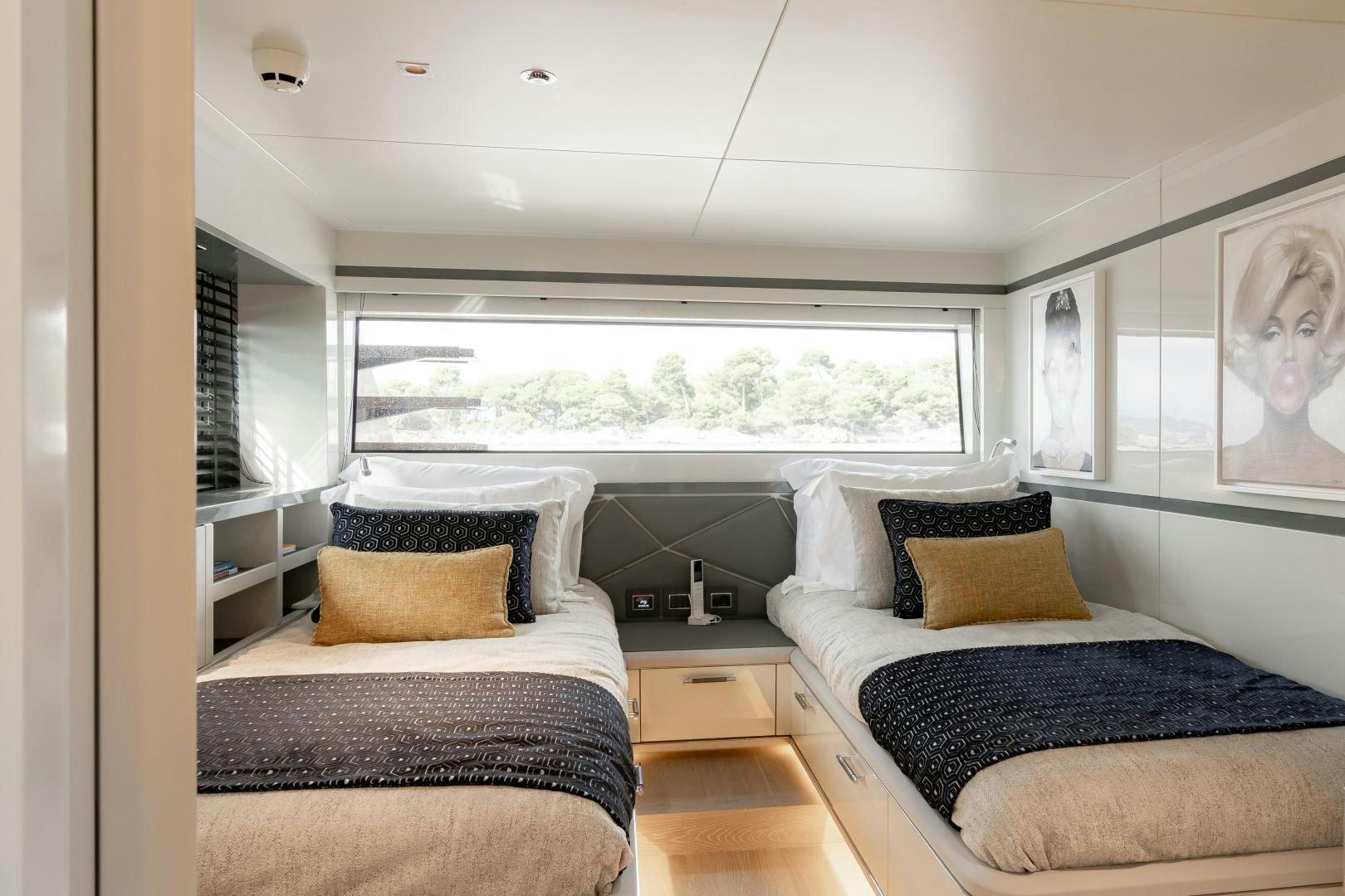 a couple of beds in a room aboard EVADNE ROCK 85 HULL 4 Yacht for Sale