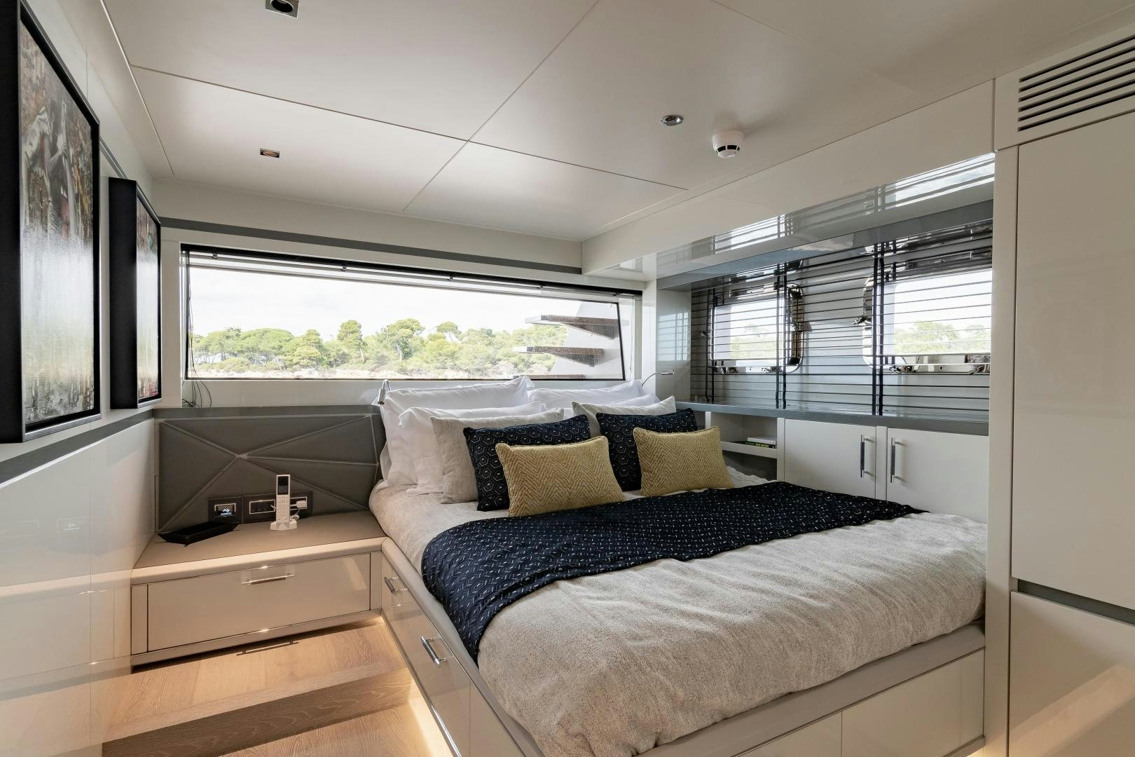 a bedroom with a large bed aboard EVADNE ROCK 85 HULL 4 Yacht for Sale