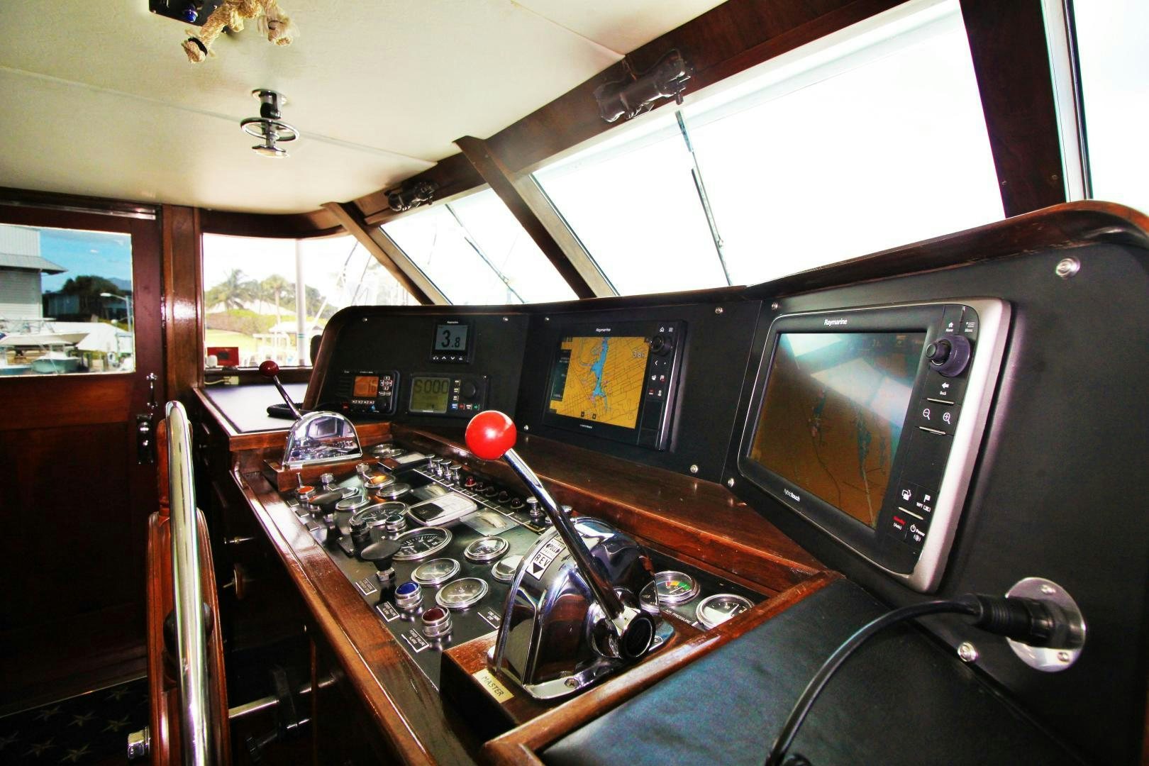 inside of a car aboard Independence Yacht for Sale