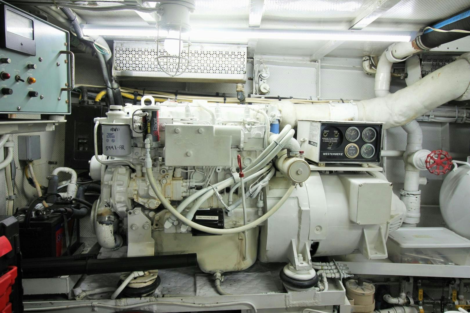a room with machinery aboard Independence Yacht for Sale