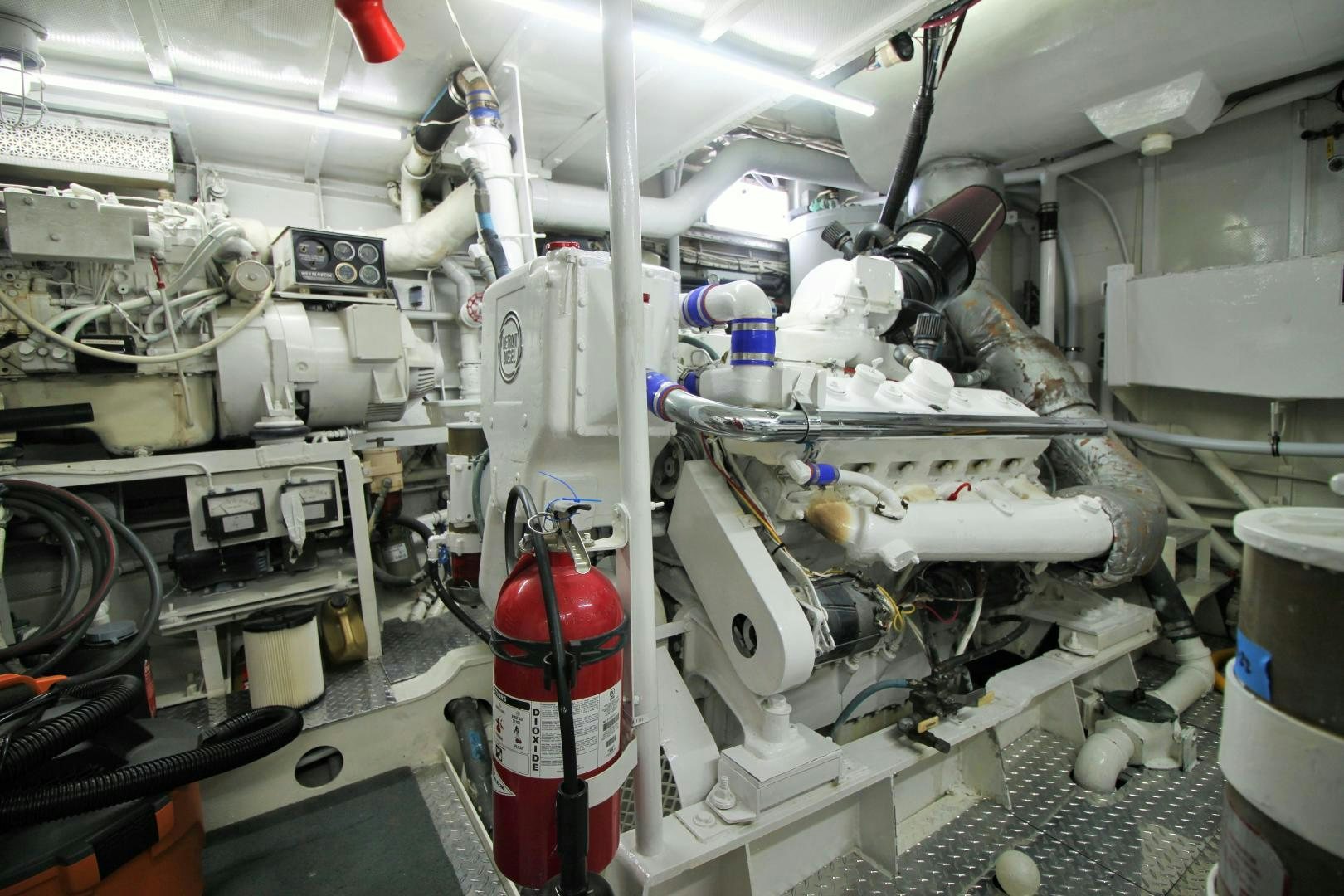 a large white machine in a room aboard Independence Yacht for Sale