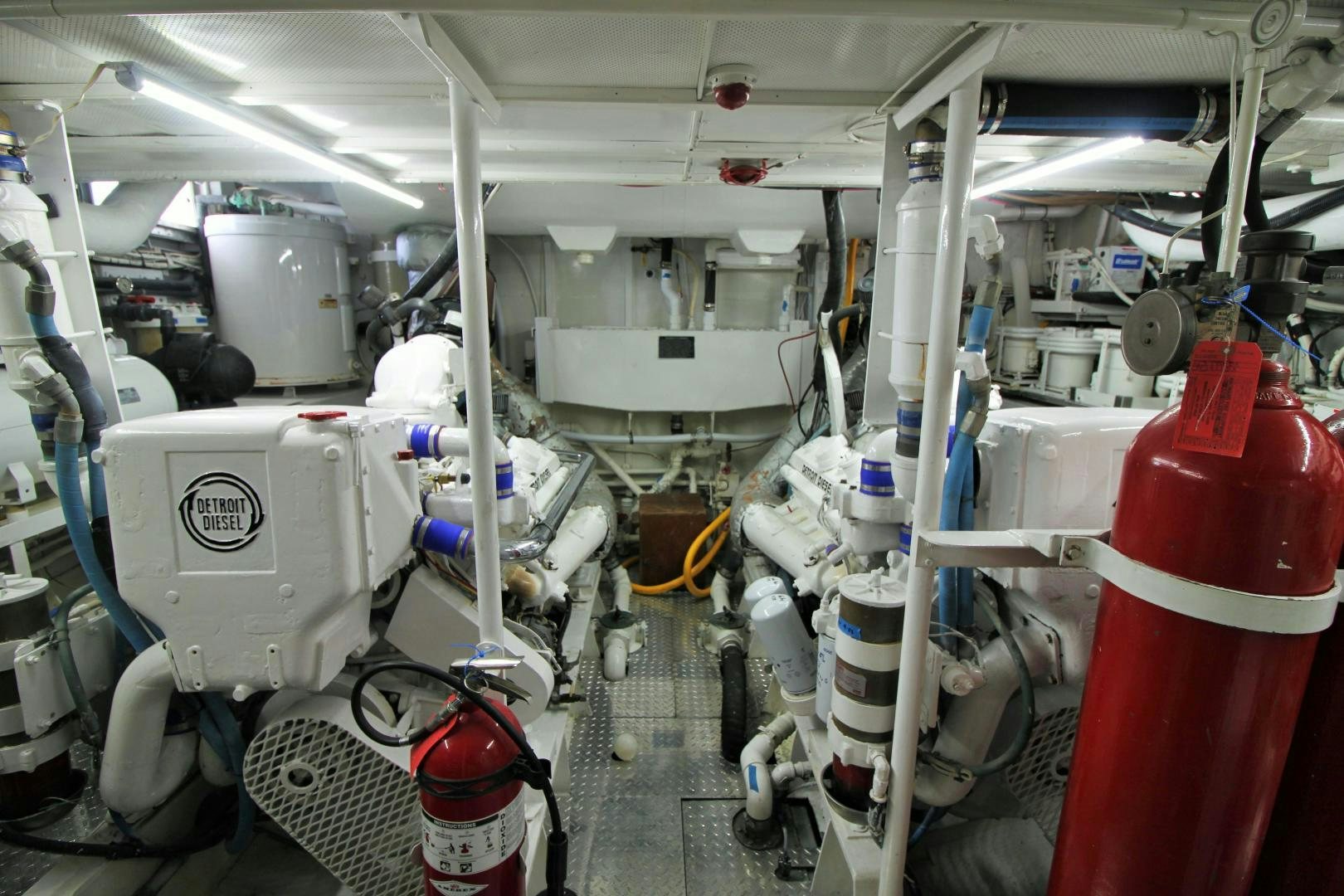 a room with white pipes and pipes aboard Independence Yacht for Sale