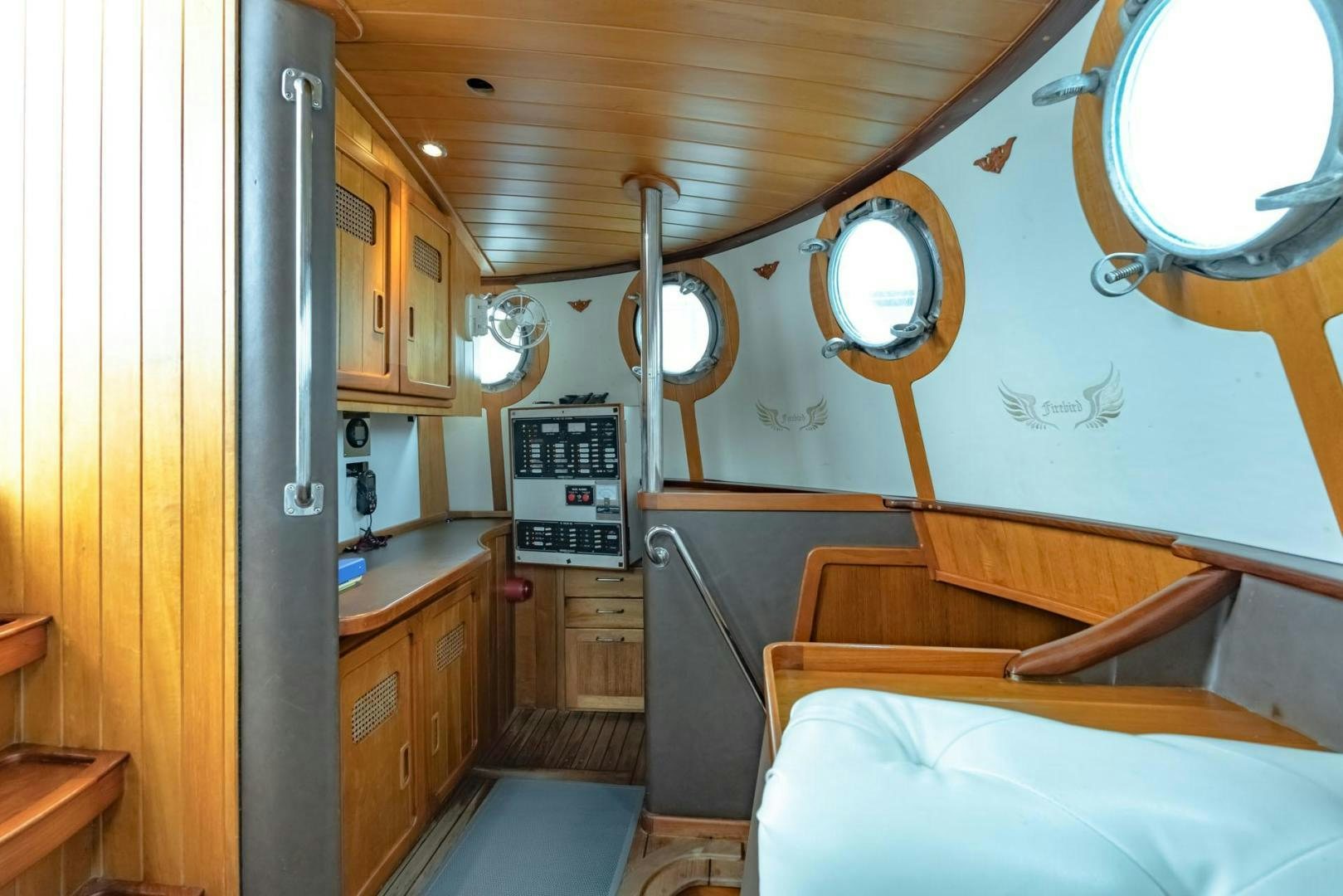 a small kitchen with a large sink aboard FIREBIRD Yacht for Sale