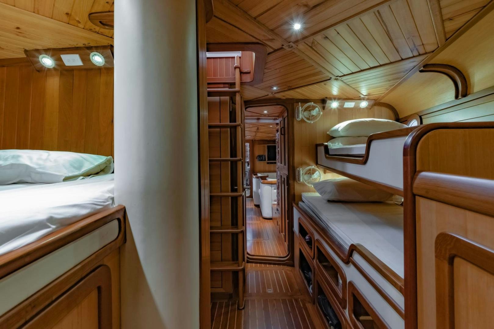 a room with bunk beds aboard FIREBIRD Yacht for Sale