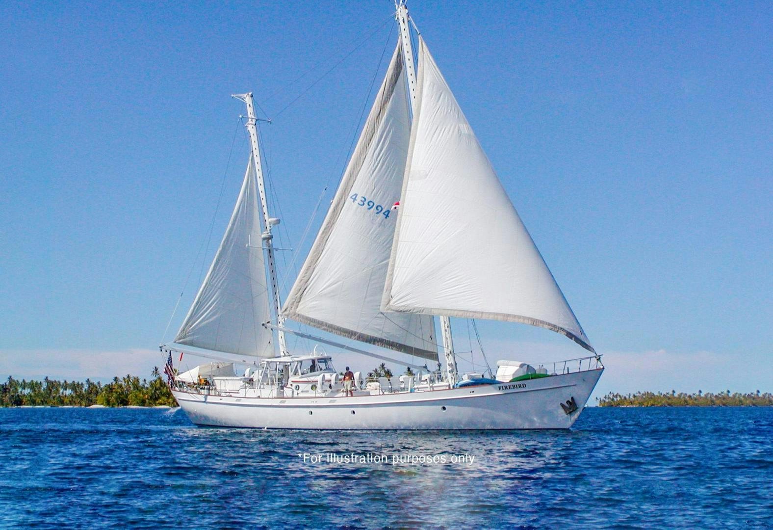 a sailboat on the water aboard FIREBIRD Yacht for Sale