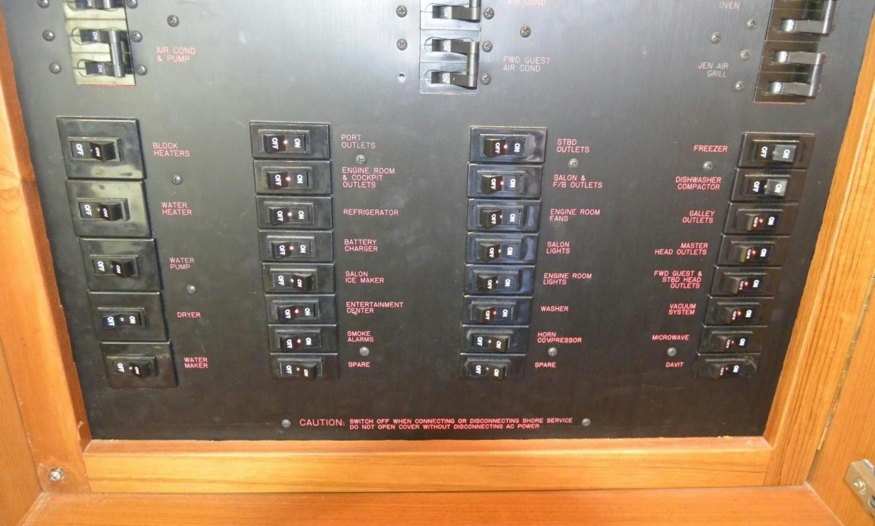 a black computer with a red and white display aboard DOG HOUSE Yacht for Sale