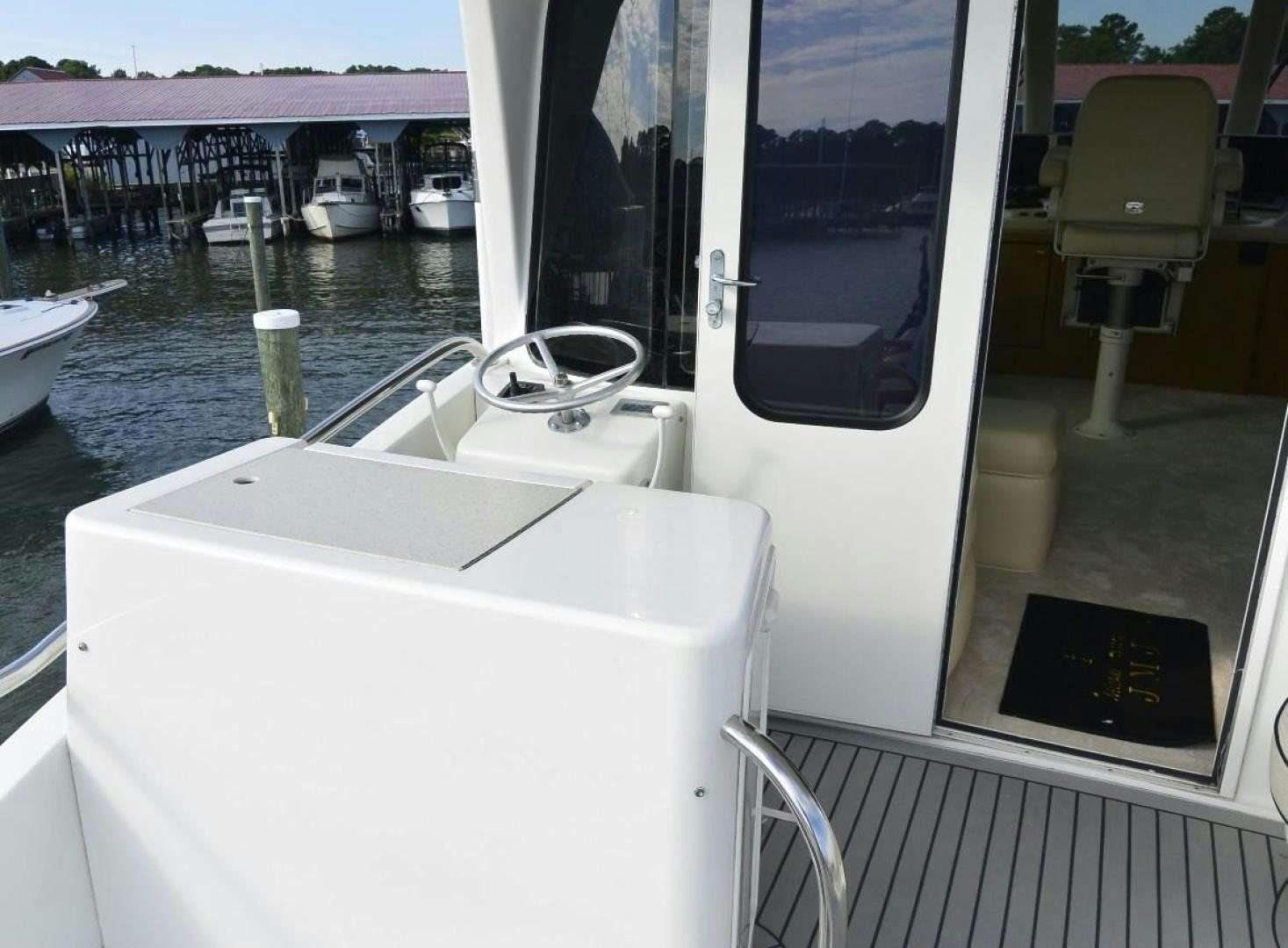 a boat on the water aboard DOG HOUSE Yacht for Sale