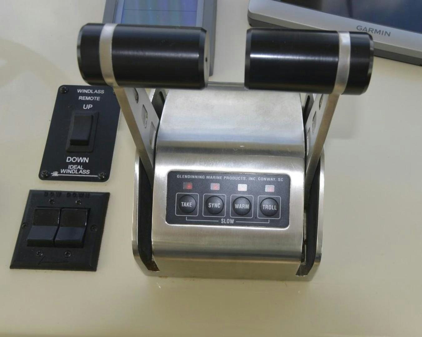 a black and white electronic device aboard DOG HOUSE Yacht for Sale