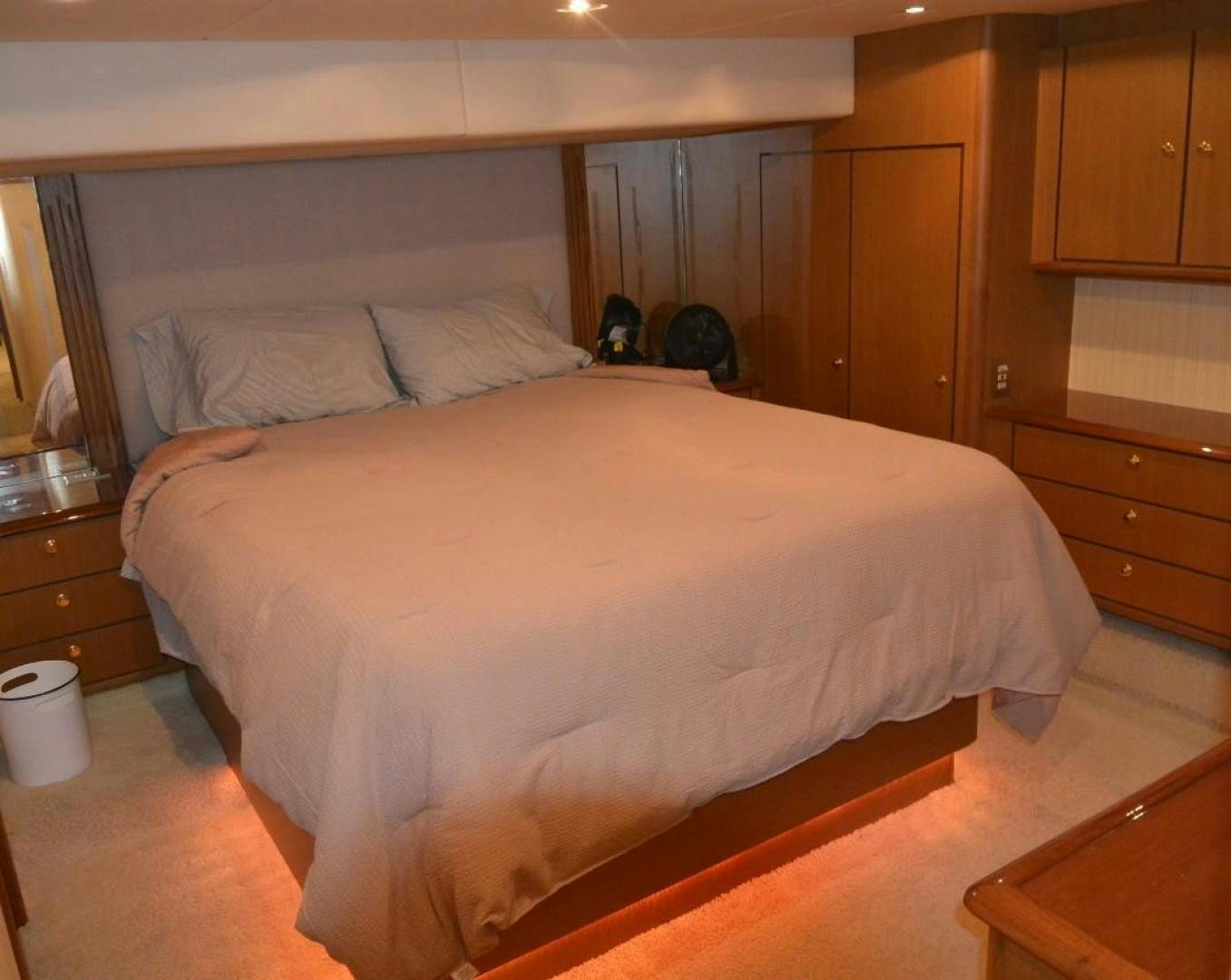 a bed in a room aboard DOG HOUSE Yacht for Sale