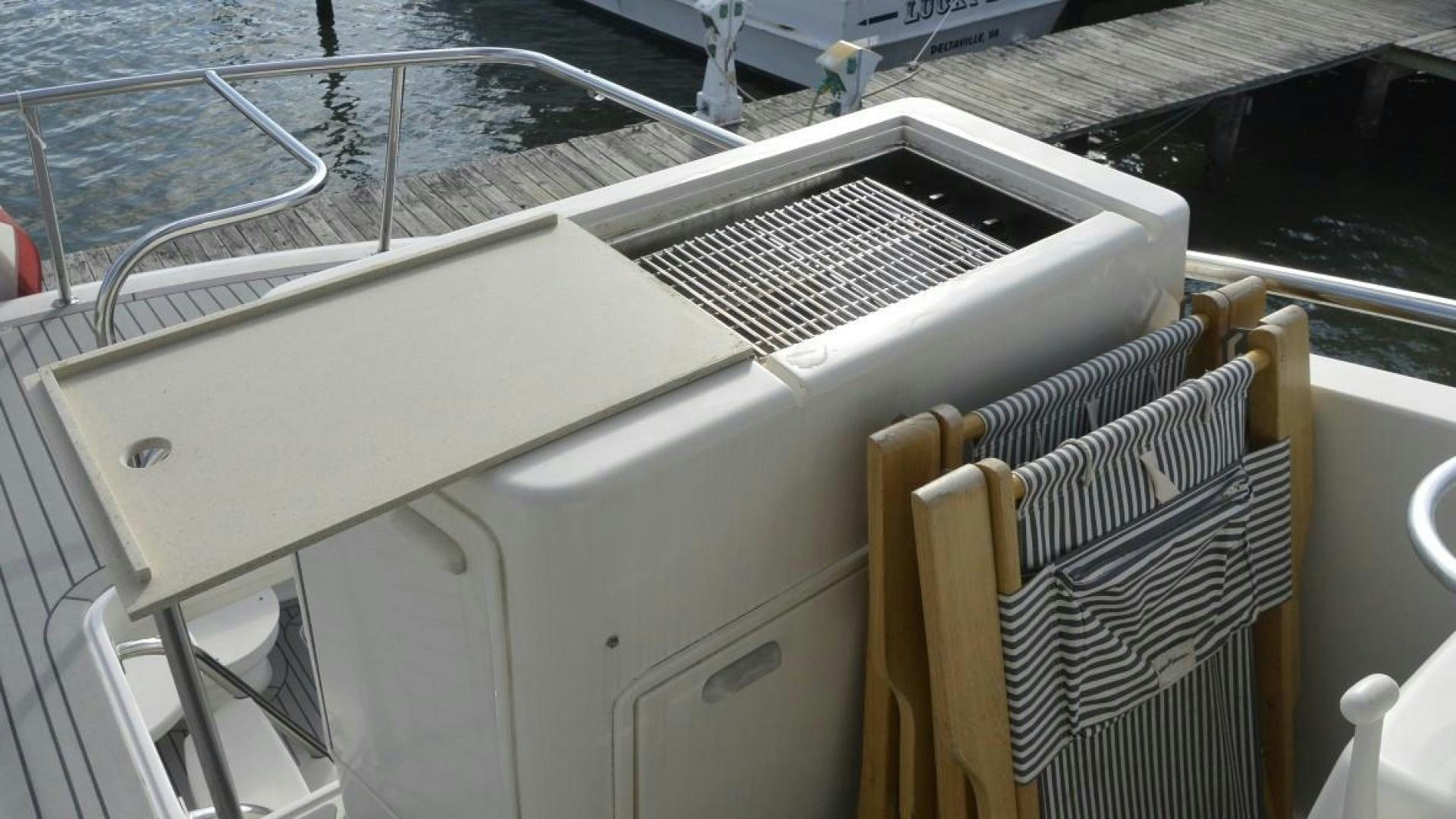 a boat with a metal frame aboard DOG HOUSE Yacht for Sale